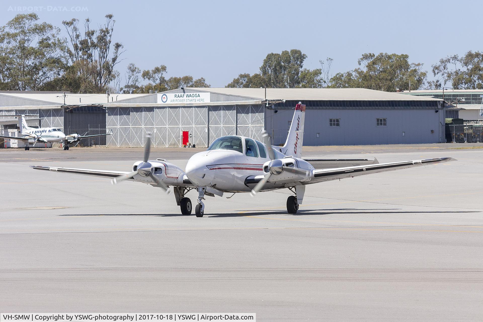 VH-SMW, 1975 Beech 58 Baron C/N TH-694, Chartair Rentals (VH-SMW) Beech 58 Baron taxiing at Wagga Wagga Airport