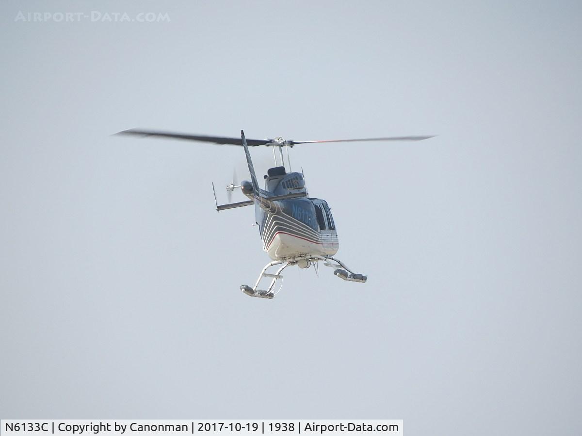 N6133C, 1991 Bell 206L-3 LongRanger III C/N 51544, Lifting off