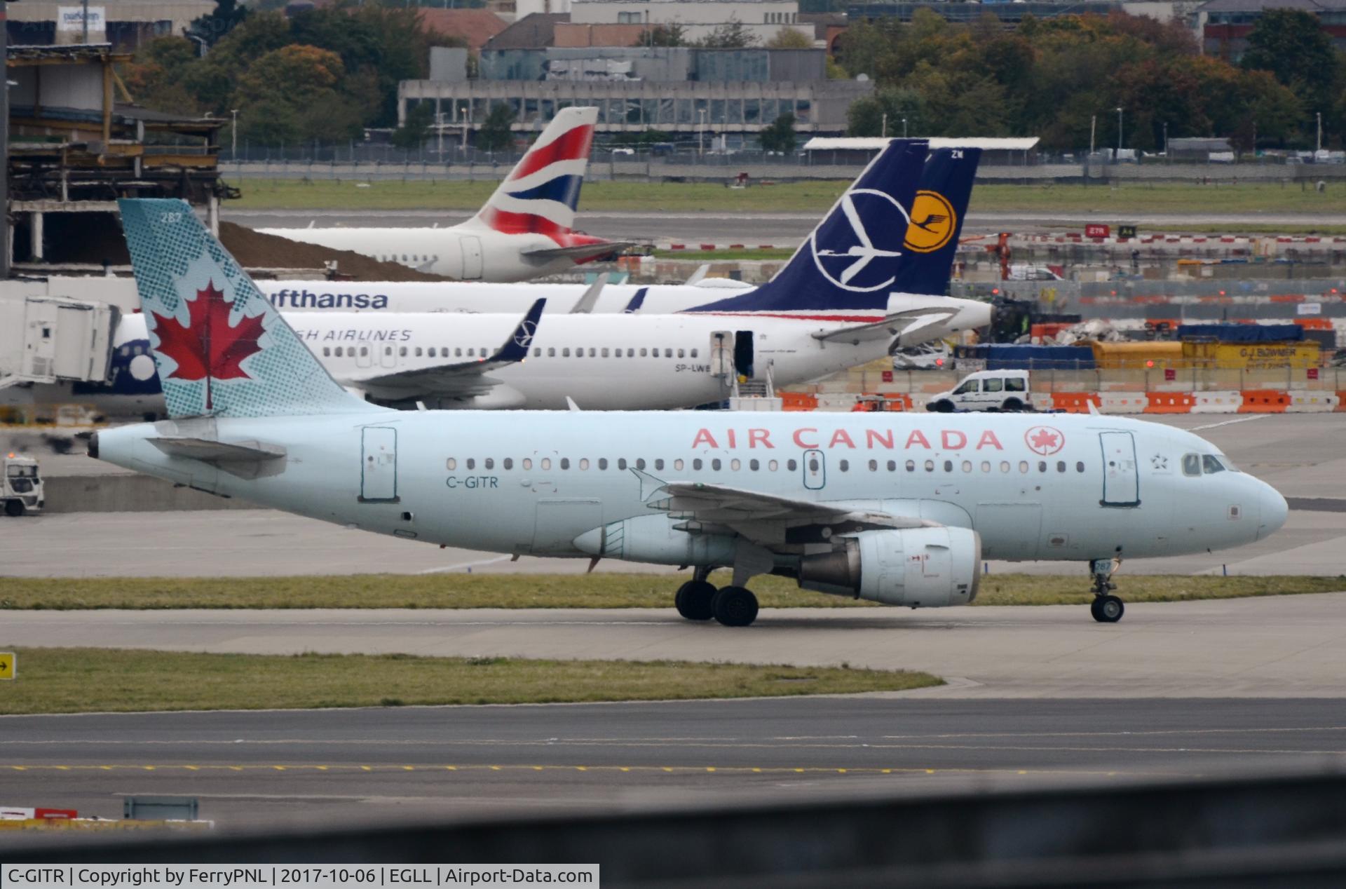 C-GITR, 2001 Airbus A319-112 C/N 1577, Air Canada A319 taxying out for departure in LHR.