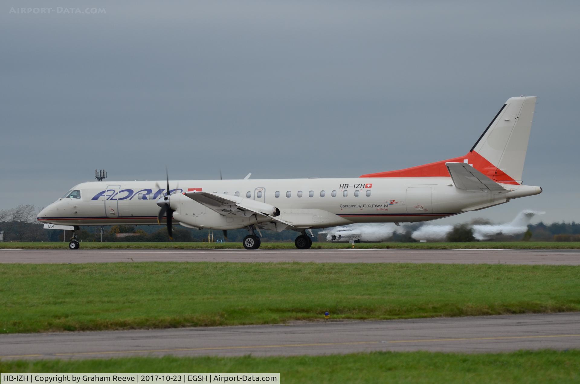HB-IZH, 1994 Saab 2000 C/N 2000-011, About to depart from Norwich.