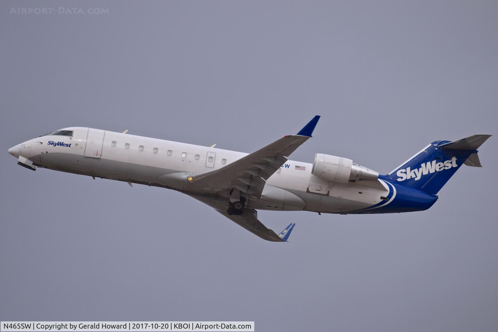 N465SW, 2003 Bombardier CRJ-200 (CL-600-2B19) C/N 7845, Take off climb out from RWY 28R.