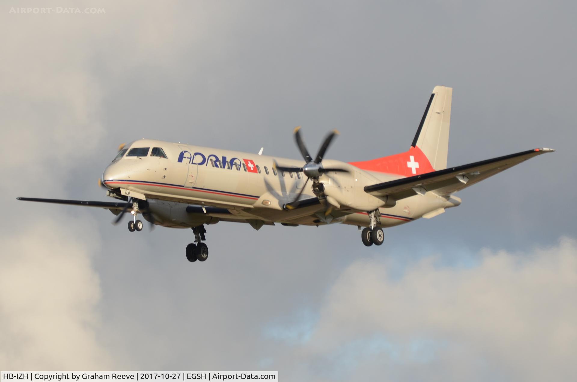 HB-IZH, 1994 Saab 2000 C/N 2000-011, Landing at Norwich.