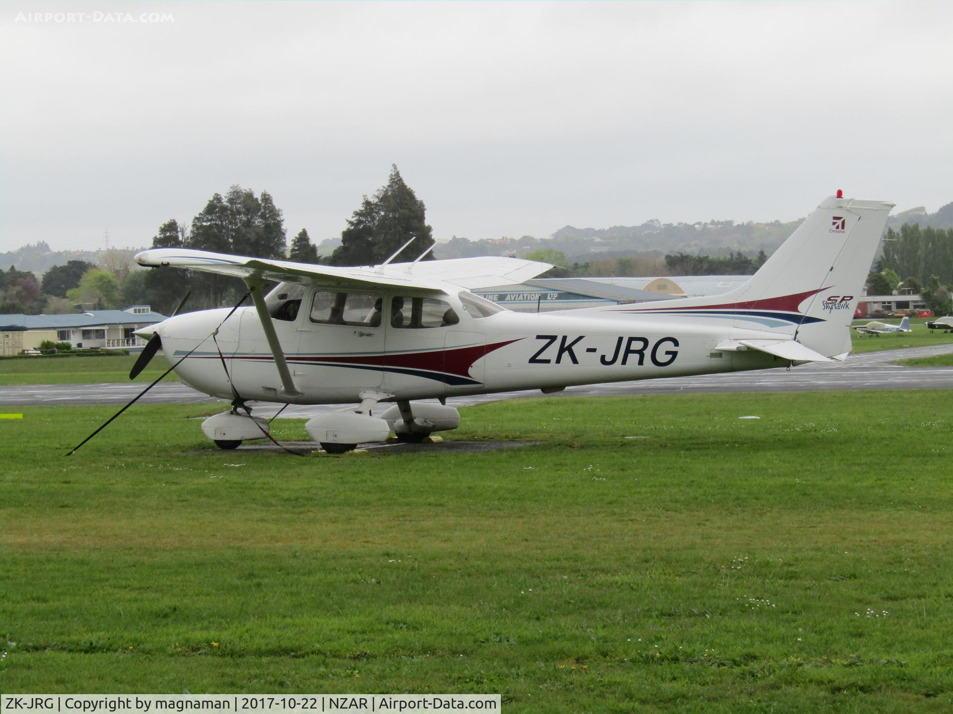 ZK-JRG, 2004 Cessna 172S C/N 172S9671, on grass at flying club