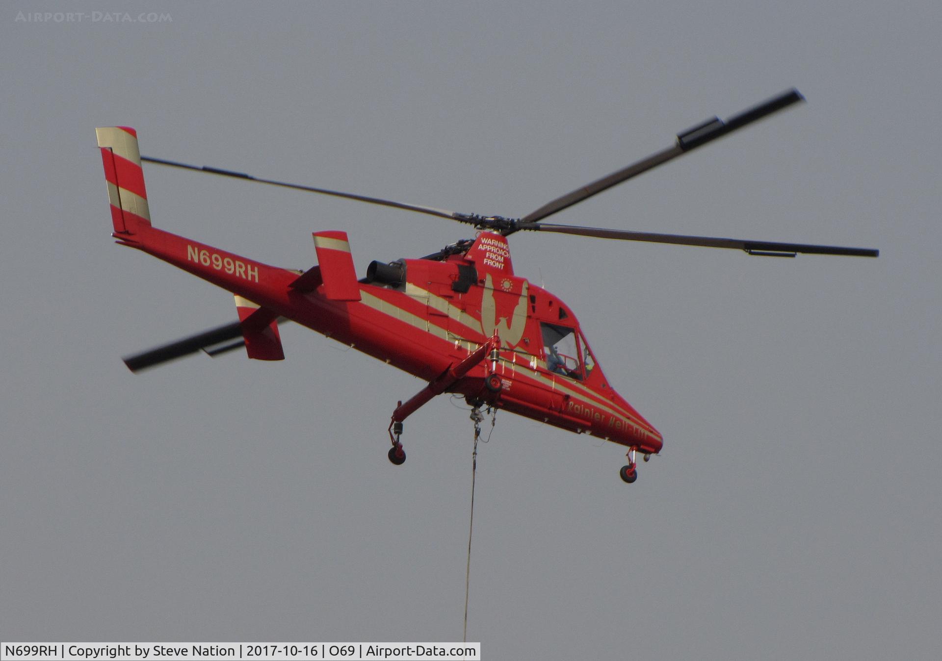 N699RH, 1994 Kaman K-1200 K-Max C/N A94-0019, Rainier Helicopters (Kirkland, WA) 1994 Kaman K-1200 K-MAX water dropping helicopter prepares to leave for action @ Petaluma Municipal Airport, CA temporary home base in support of efforts to control devastating Oct 2017 Northern California wildfires
