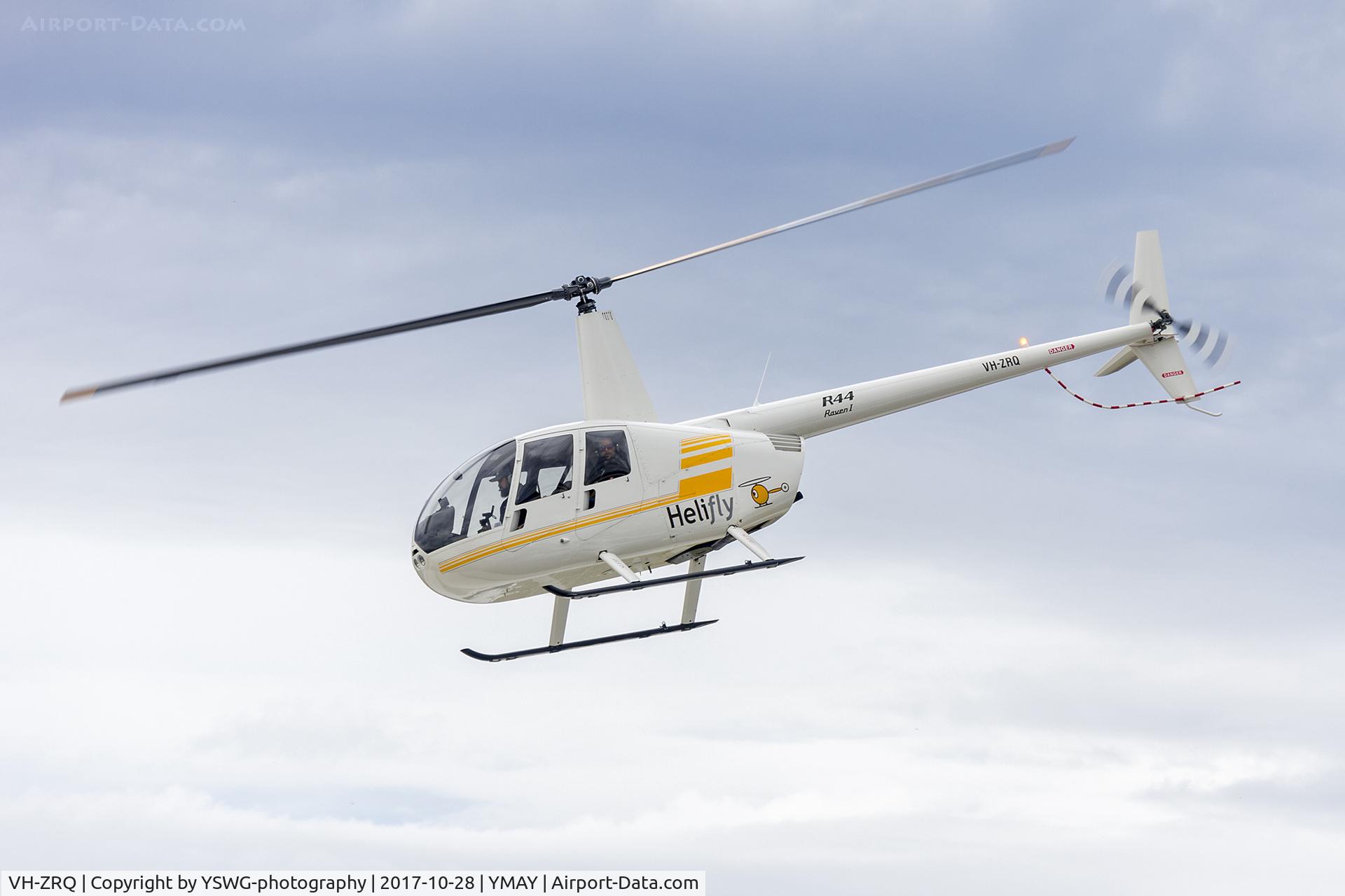 VH-ZRQ, 2012 Robinson R44 Raven I C/N 2208, Helifly (VH-ZRQ) Robinson R44 Raven I departing for a joy flight at Albury Airport.