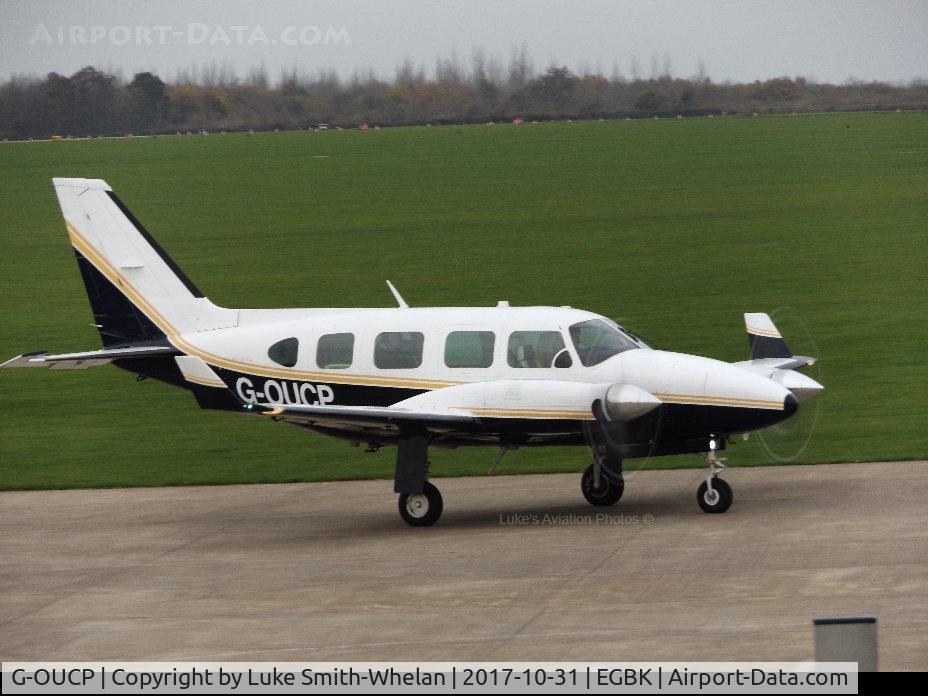 G-OUCP, 1979 Piper PA-31-310 Navajo Navajo C/N 31-7912117, Parking on the apron at Sywell Aerodrome after a local sortie. 

Full prop-blur on both props.