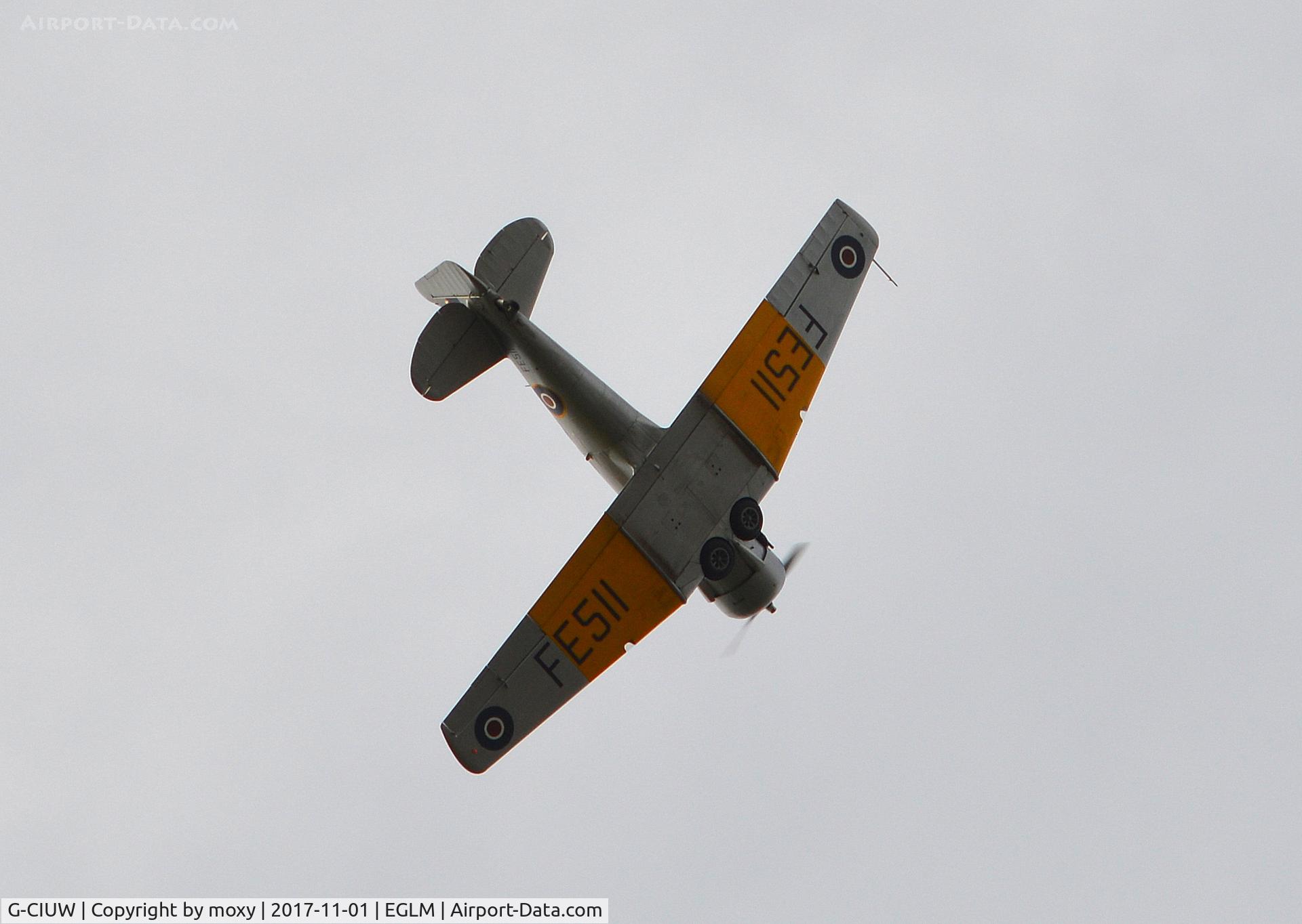 G-CIUW, 1942 Noorduyn AT-16 Harvard IIB C/N 14-245, Noorduyn AT-16 Harvard IIB preparing to land at White Watham. Marked as FE511.