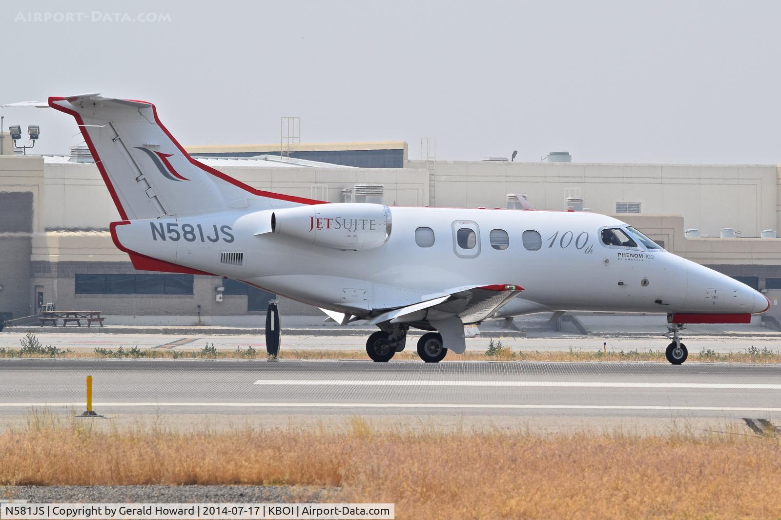 N581JS, 2009 Embraer EMB-500 Phenom 100 C/N 50000110, Landing roll out on RWY 28L.  Embraer EMB-500 Phenom 100.
