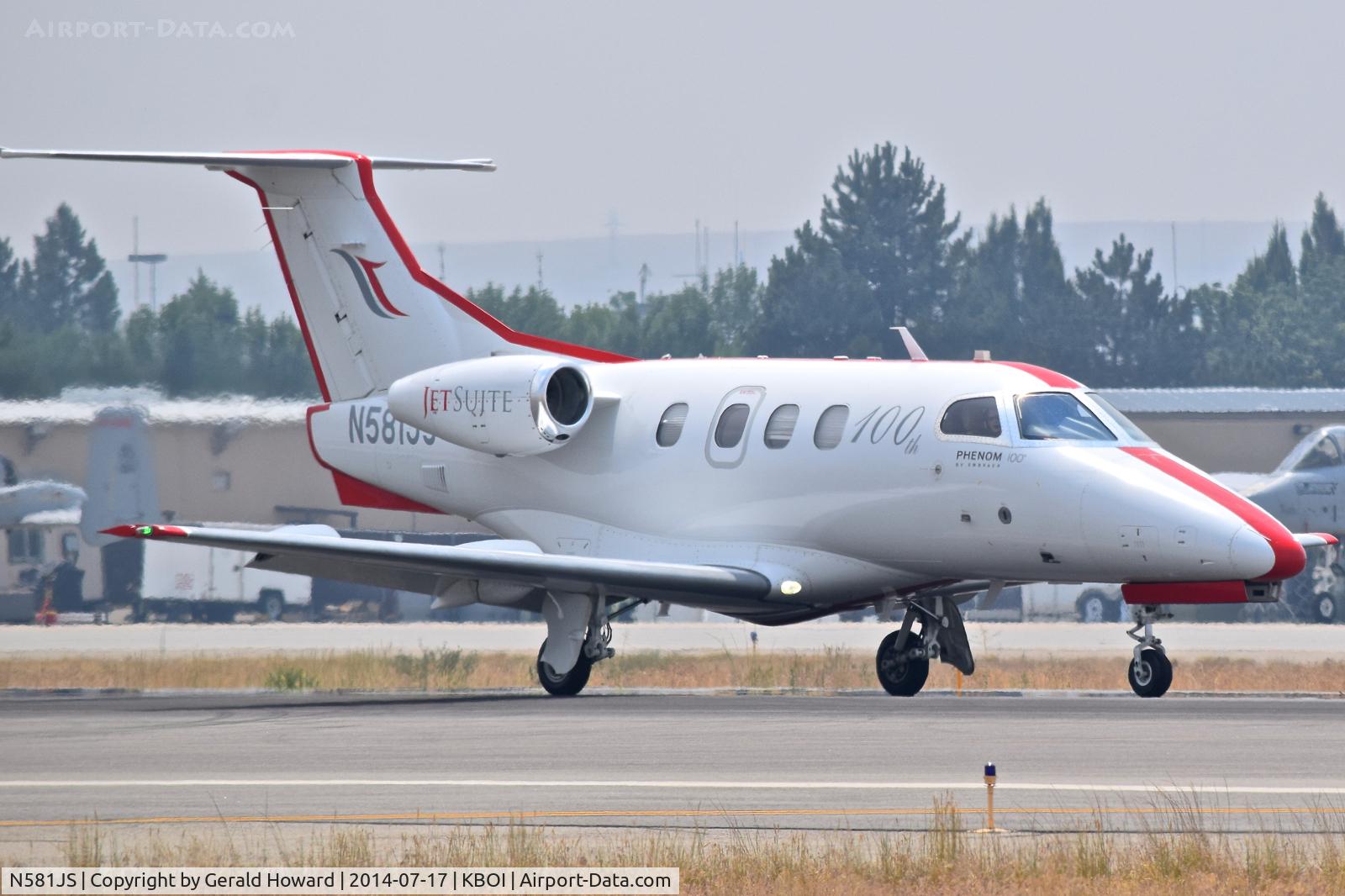 N581JS, 2009 Embraer EMB-500 Phenom 100 C/N 50000110, Landing roll out on RWY 28L.  Embraer EMB-500 Phenom 100.