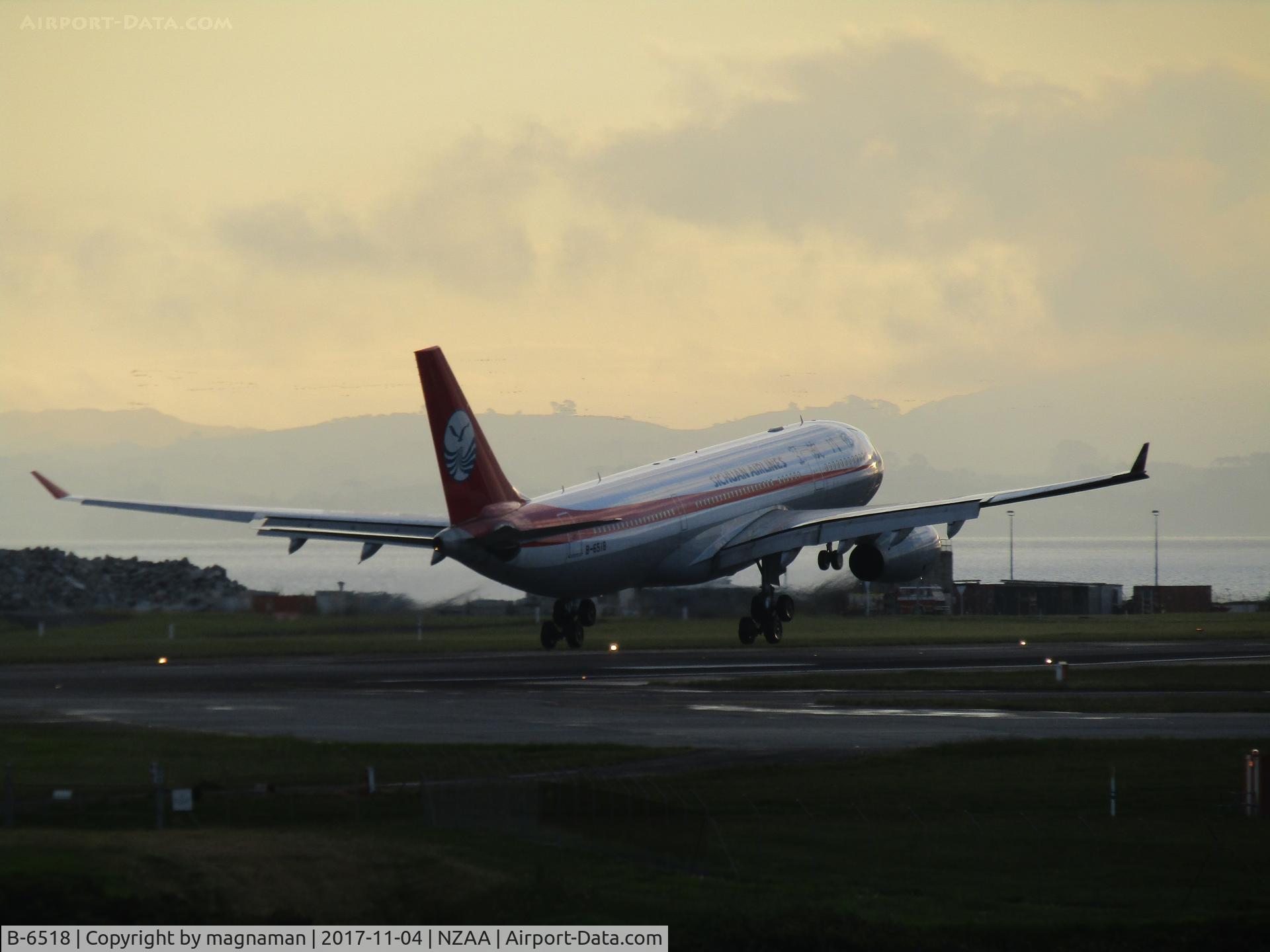 B-6518, 2010 Airbus A330-243 C/N 1082, basically touchdown