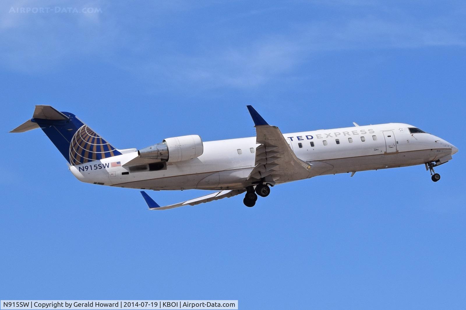 N915SW, 2002 Bombardier CRJ-200LR (CL-600-2B19) C/N 7615, Departing RWY 28L.