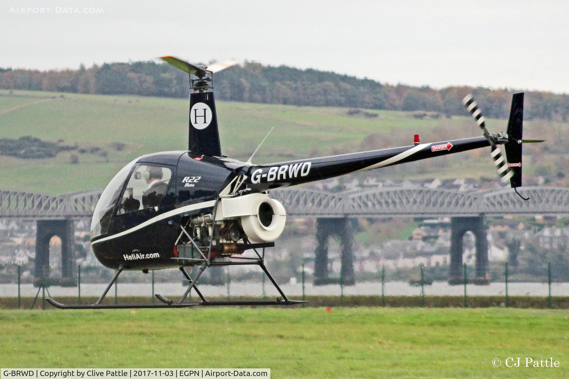 G-BRWD, 1989 Robinson R22 Beta C/N 1231, In action at Dundee