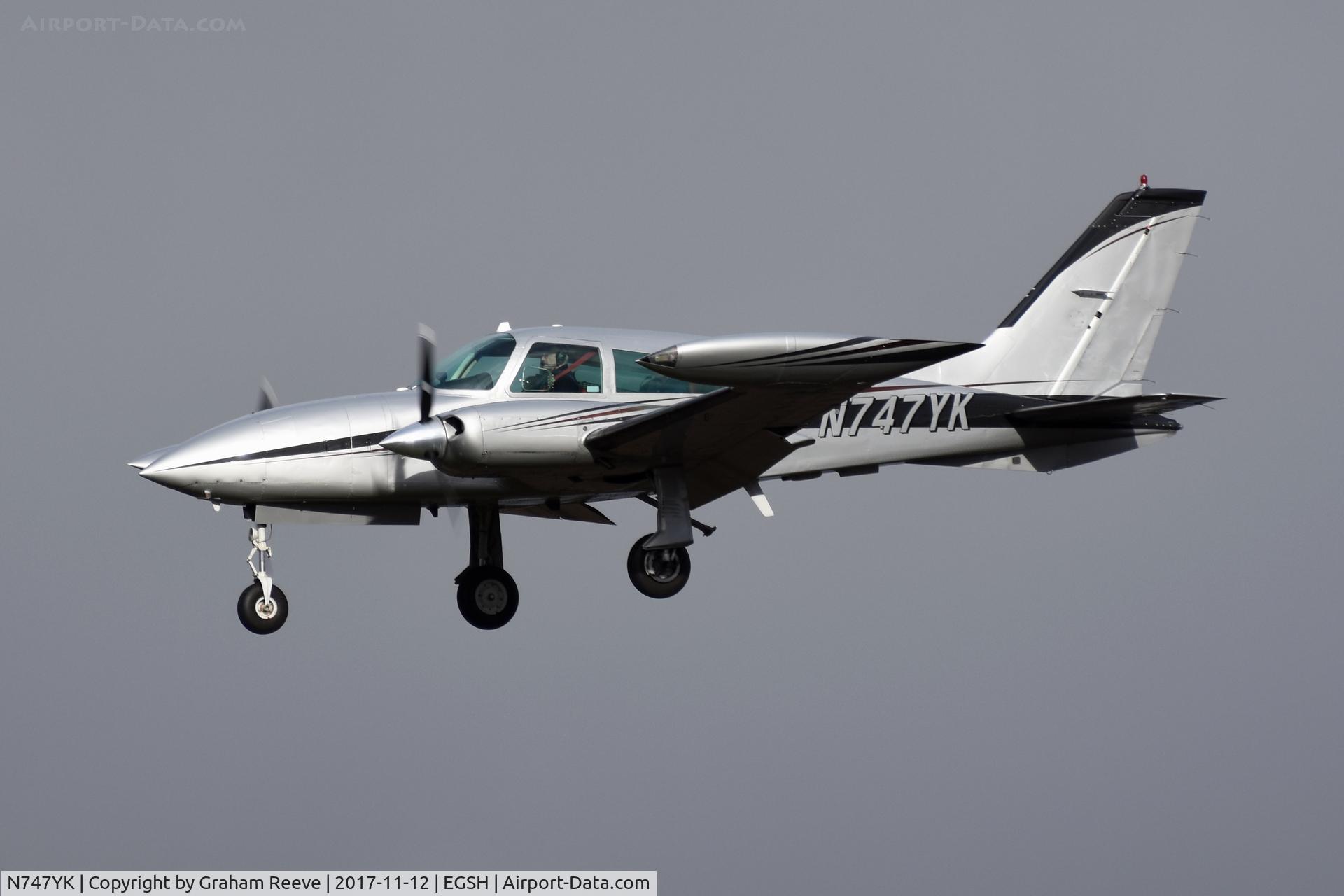 N747YK, 1975 Cessna 310R C/N 310R0138, Landing at Norwich.