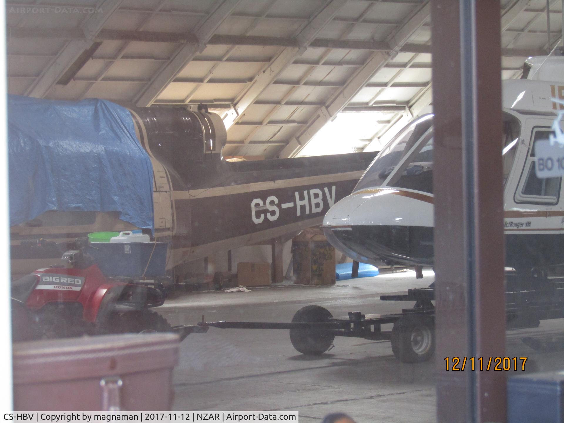 CS-HBV, Bell TH-1L C/N 6426, hiding in hangar at ardmore - imported back in march 2017