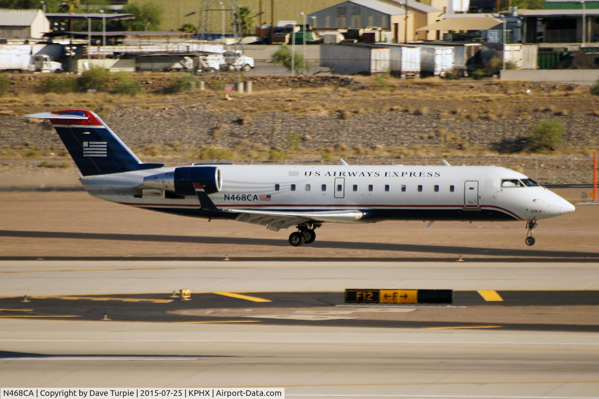 N468CA, 2002 Bombardier CRJ-200ER (CL-600-2B19) C/N 7649, It's a bit of an illusion.  Aircraft appears to be taxiing, but is actually still airborne.