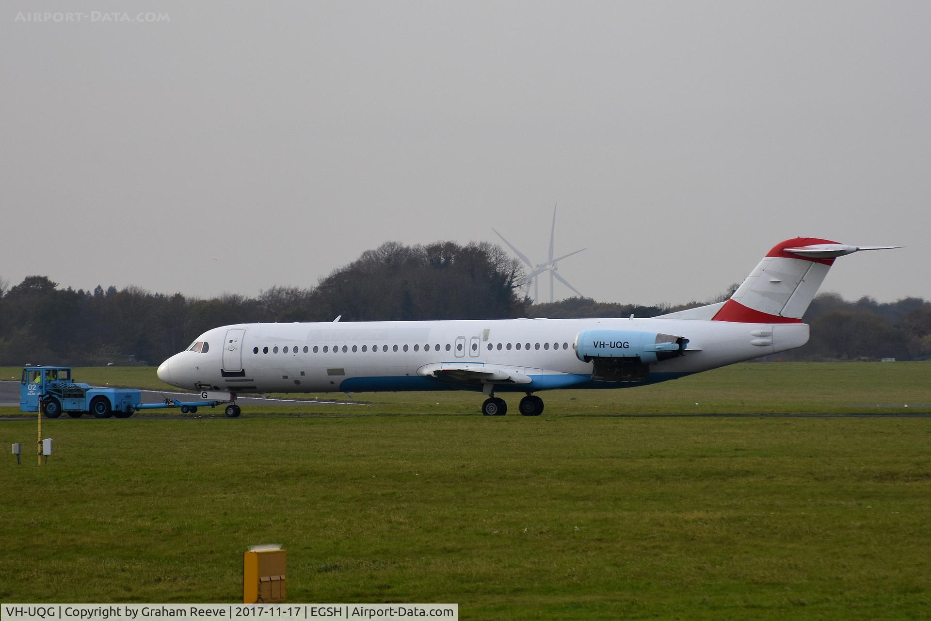 VH-UQG, 1993 Fokker 100 (F-28-0100) C/N 11446, Under tow at Norwich.