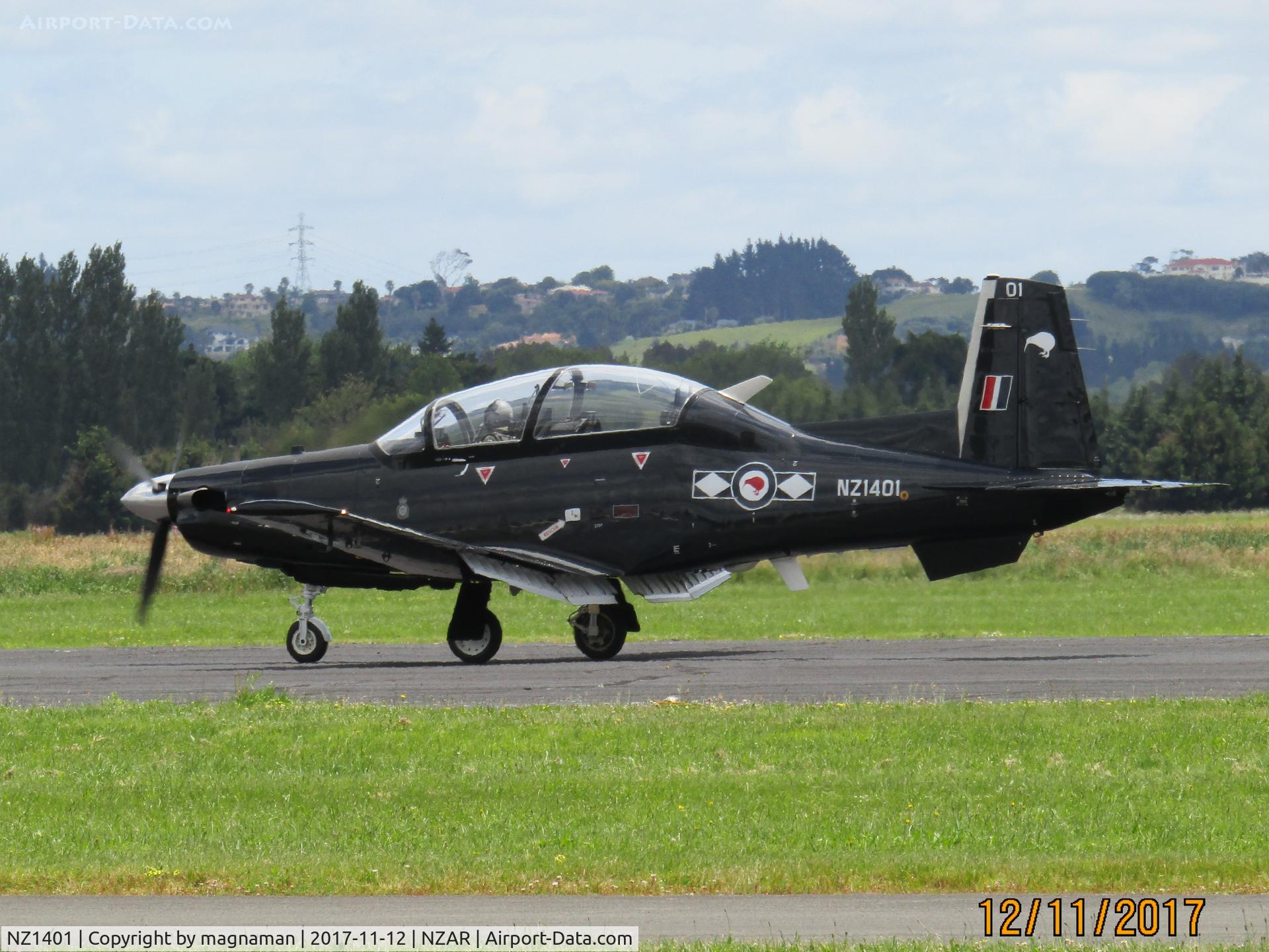 NZ1401, 2014 Raytheon T-6C Texan II C/N PM-37, full flaps on landing