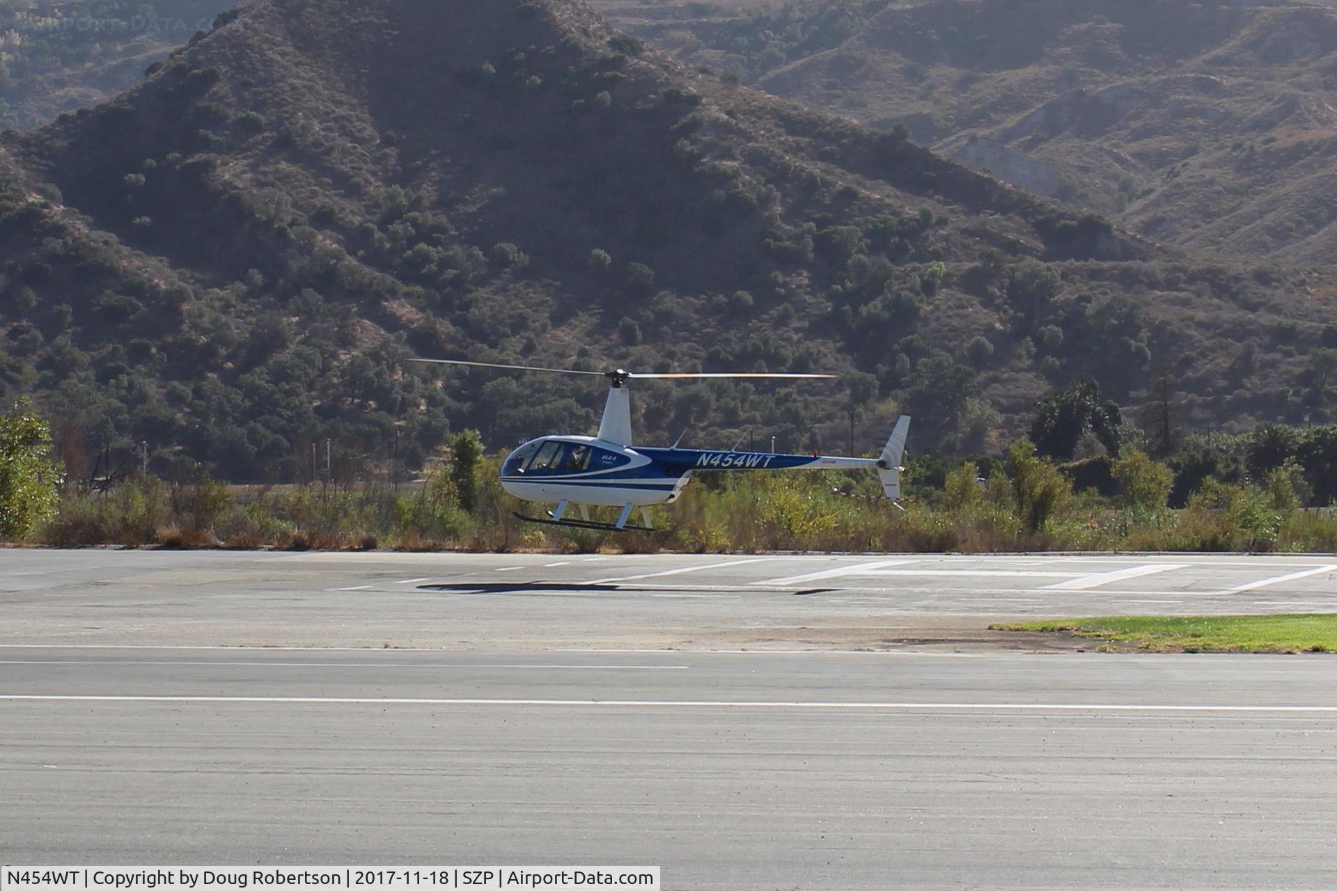 N454WT, 2001 Robinson R44 Raven II C/N 1042, 2001 Robinson 44 RAVEN, Lycoming O-540-F1B5 derated to 205 Hp continuous, liftoff from SZP Helipad