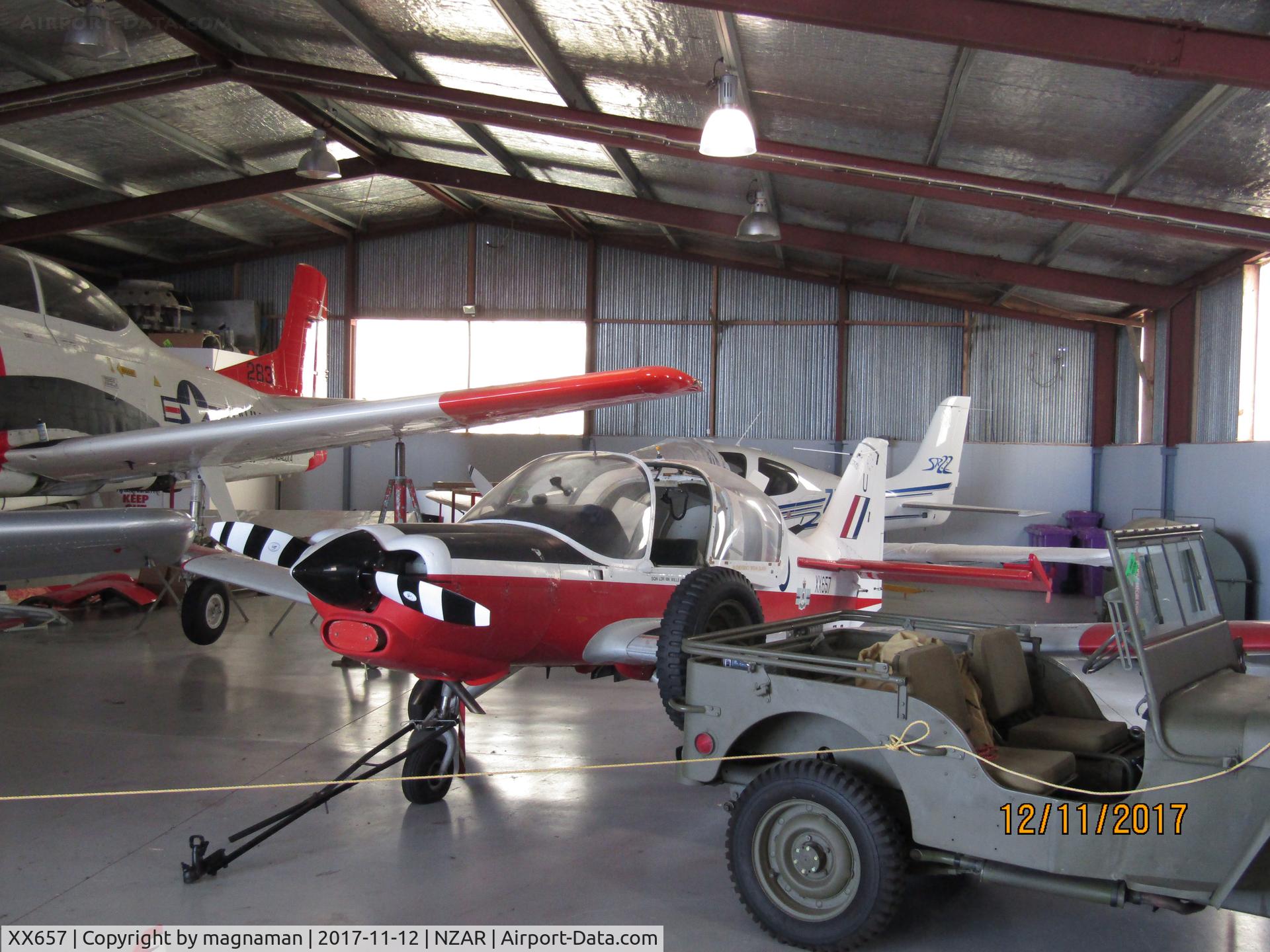 XX657, 1974 Scottish Aviation Bulldog T.1 C/N BH.120/315, in crowded hangar at AMZ during open day