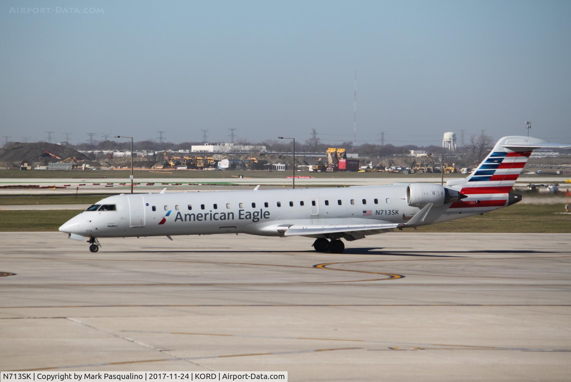 N713SK, 2004 Bombardier CRJ-701ER (CL-600-2C10) Regional Jet C/N 10174, CL-600-2C10