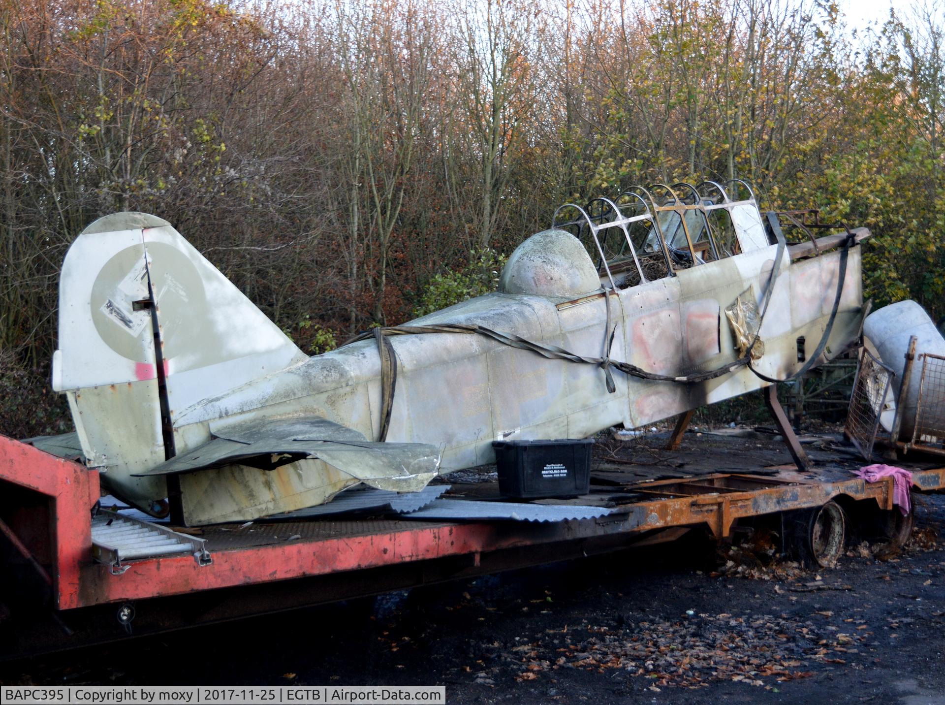 BAPC395, Pilatus P-2/05 replica C/N Not found BAPC395, Pilatus P-2/05 replica now in yard next to Parkhouse Aviation, Wycombe Air Park.