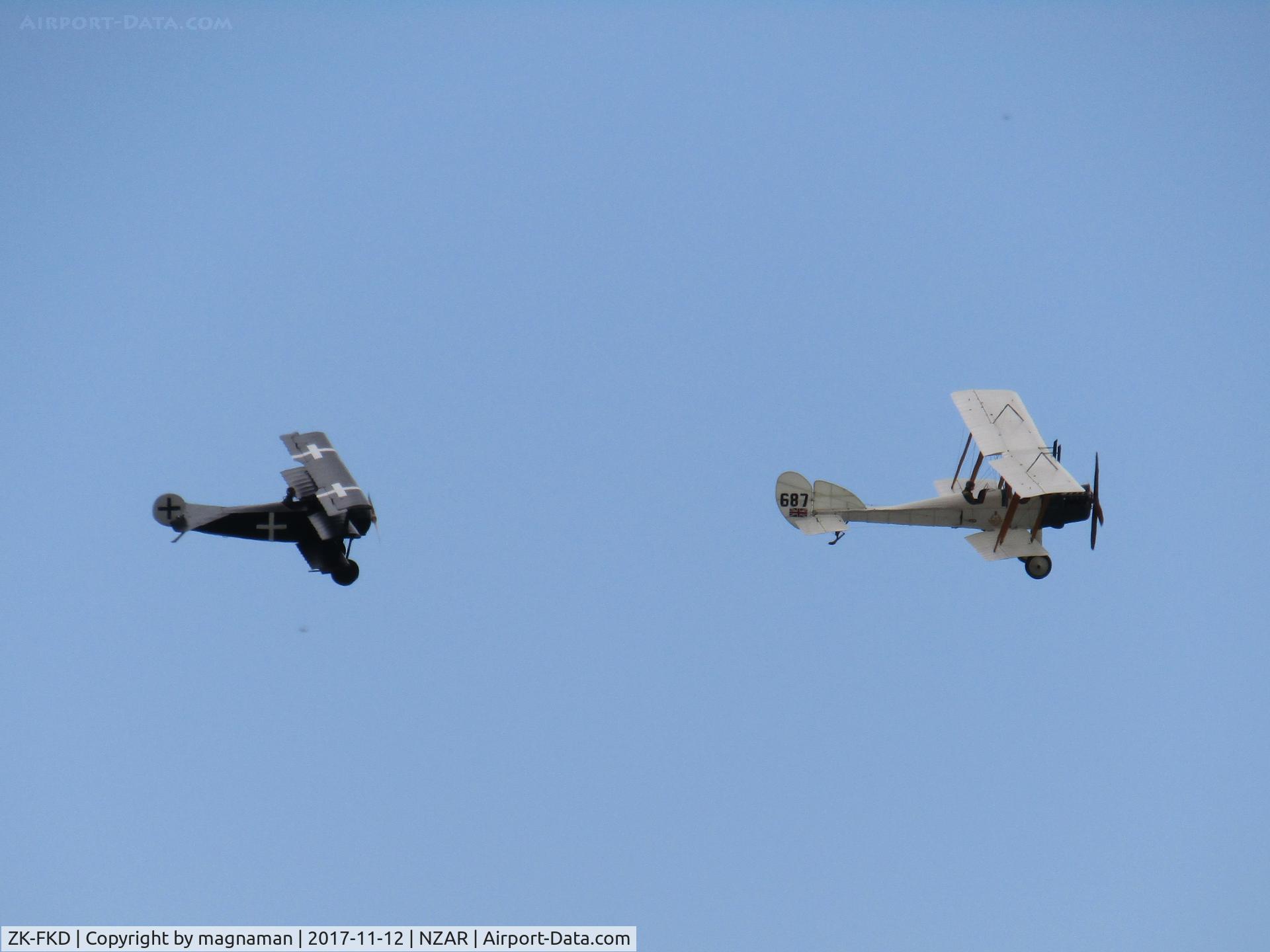 ZK-FKD, Fokker Dr-1 Triplane Replica C/N CAS 02, Fokker Triplane chasing a BE2a (ZK-VCM)