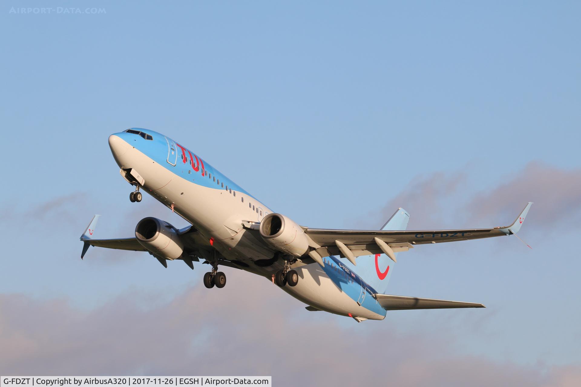 G-FDZT, 2011 Boeing 737-8K5 C/N 37248, Departing in the winter sun