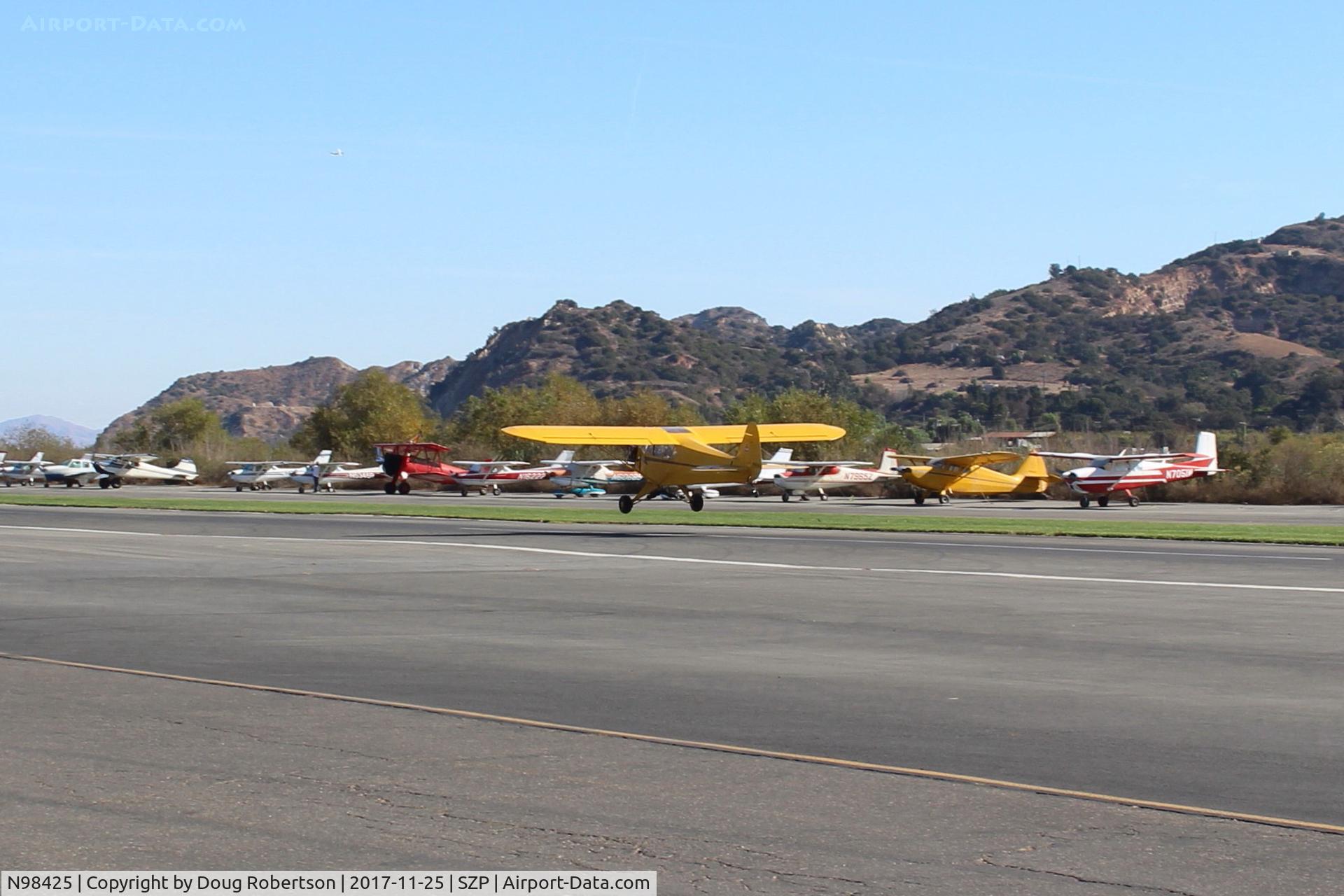 N98425, 1946 Piper J3C-65 Cub Cub C/N 18612, 1946 Piper J3C-65 CUB, Continental C90 90 Hp upgrade by STC, near touchdown Rwy 04. The wind will shift to Rwy 22 later today.