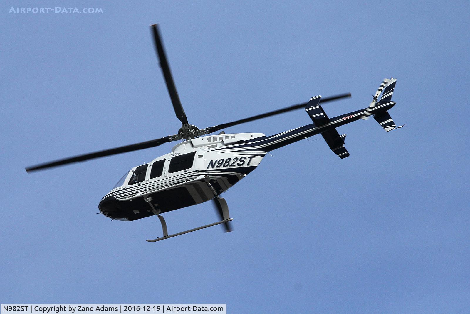 N982ST, 1997 Bell 407 C/N 53200, Flying over Fort Worth, TX