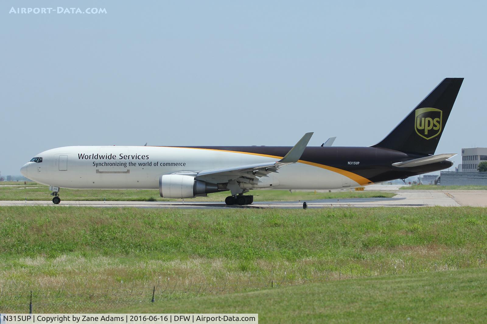N315UP, 1996 Boeing 767-34AF C/N 27743, Departing the UPS ramp at DFW Airport
