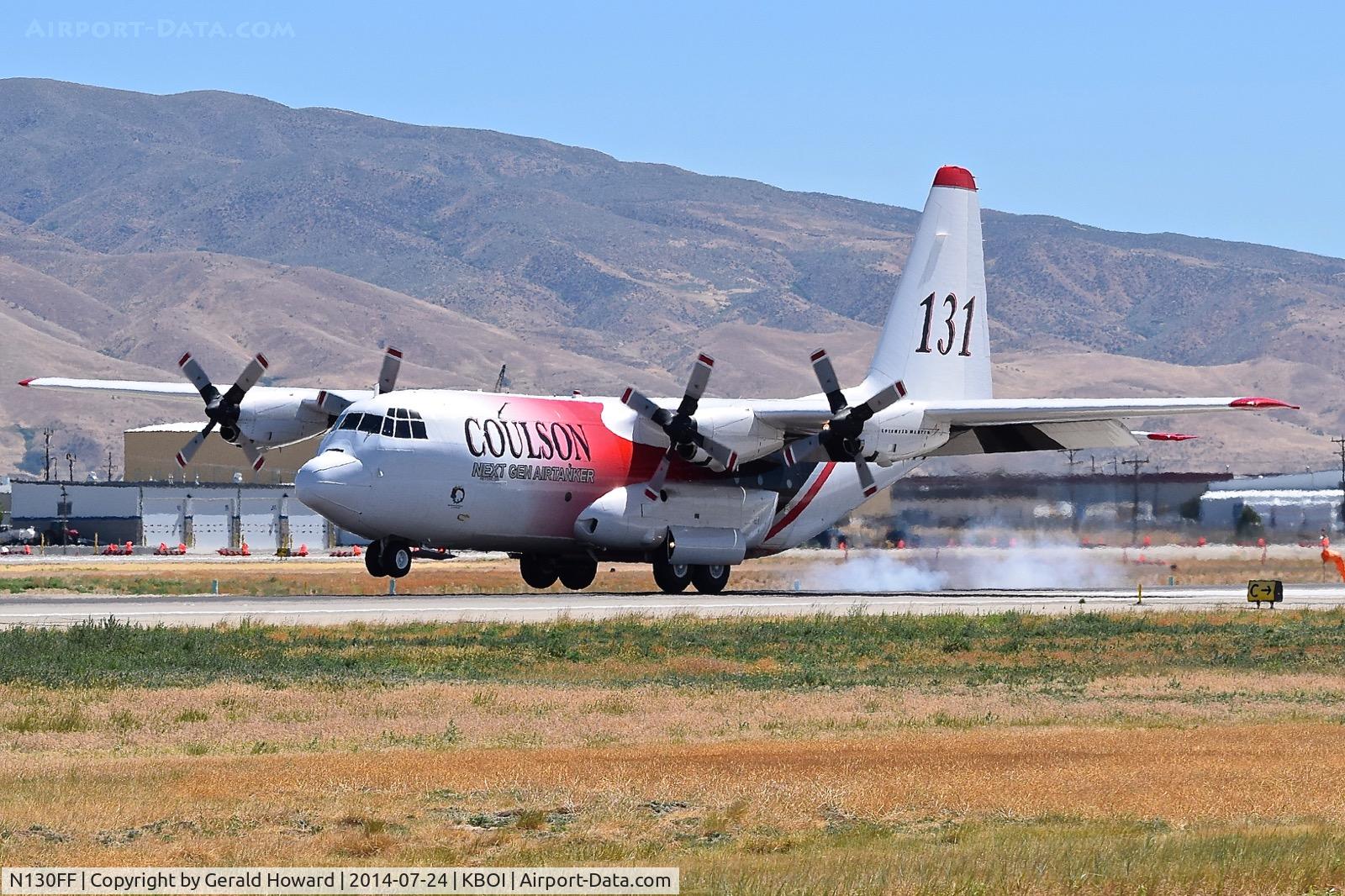 N130FF, 1980 Lockheed EC-130Q Hercules C/N 382-4901, Landing touch down on RWY 28L.