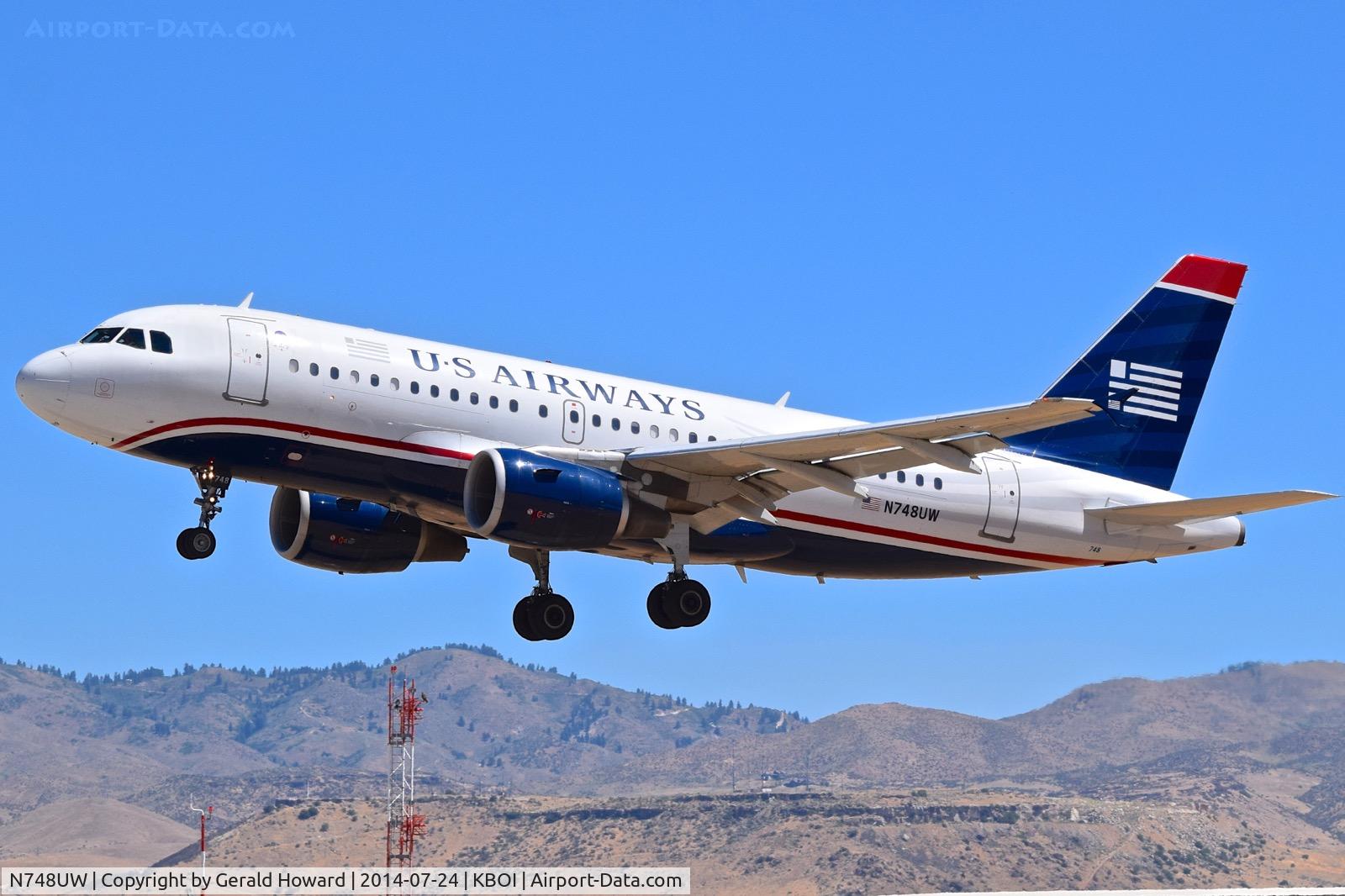 N748UW, 2000 Airbus A319-112 C/N 1311, Landing RWY 28L.