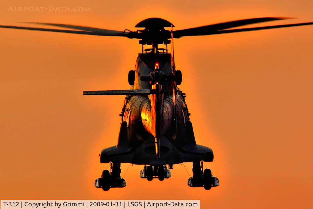 T-312, 1987 Aerospatiale TH89 Super Puma (AS-332M1) C/N 2224, This Super Puma arrived with the last climpses of light - WEF 2009