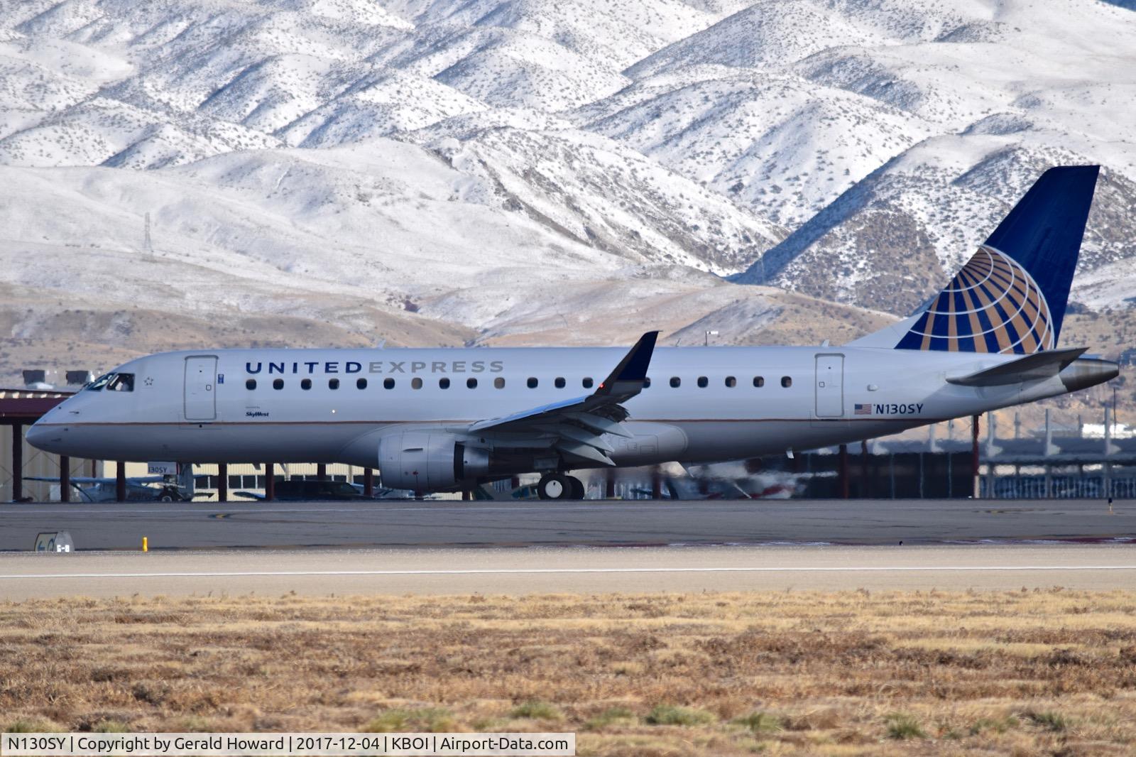 N130SY, 2015 Embraer 175LR (ERJ-170-200LR) C/N 17000449, Turning of RWY 28R onto Golf.