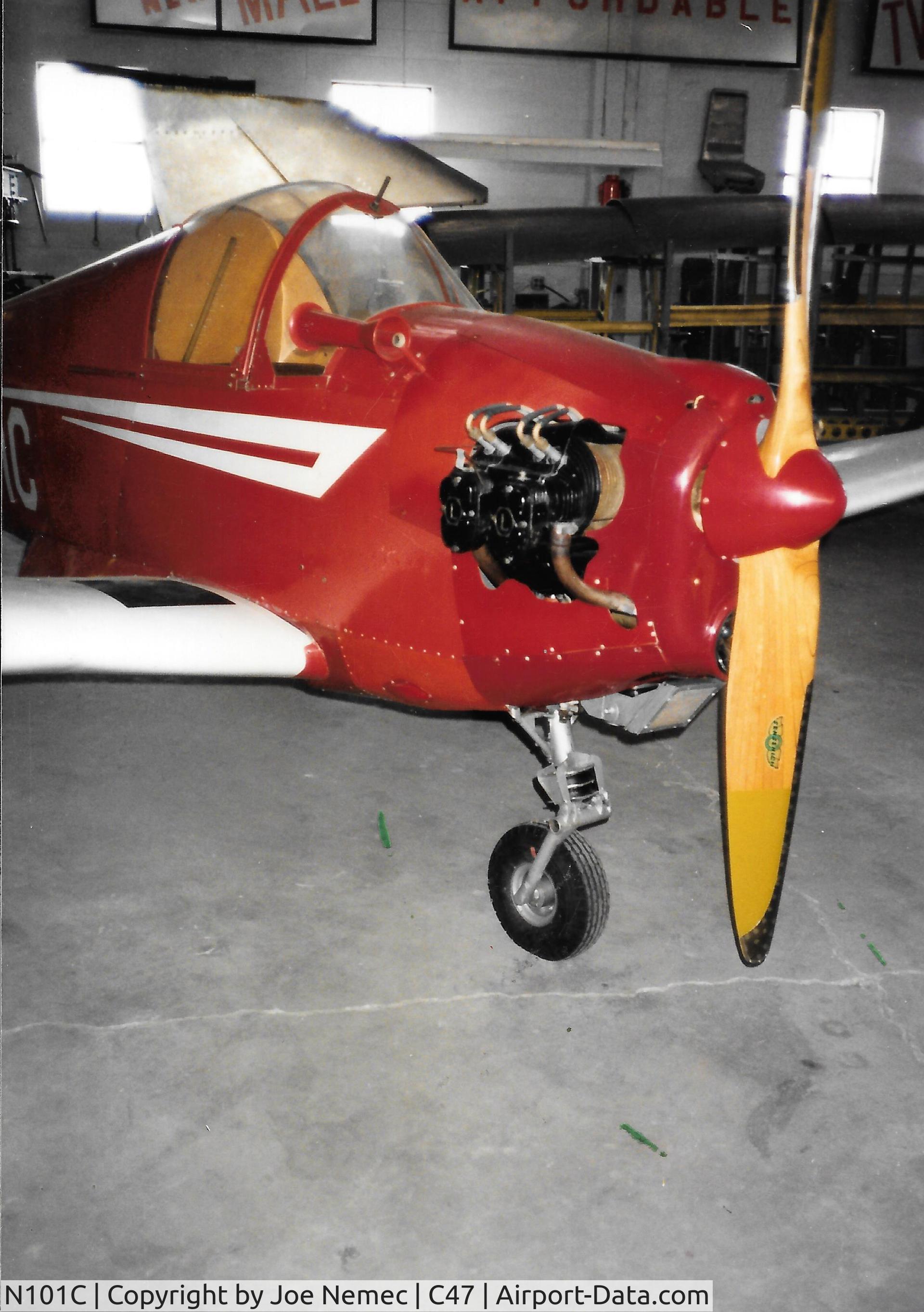 N101C, 1949 Mooney M-18L C/N 62, at Bob Mael Airfield in Portage, Wisconsin