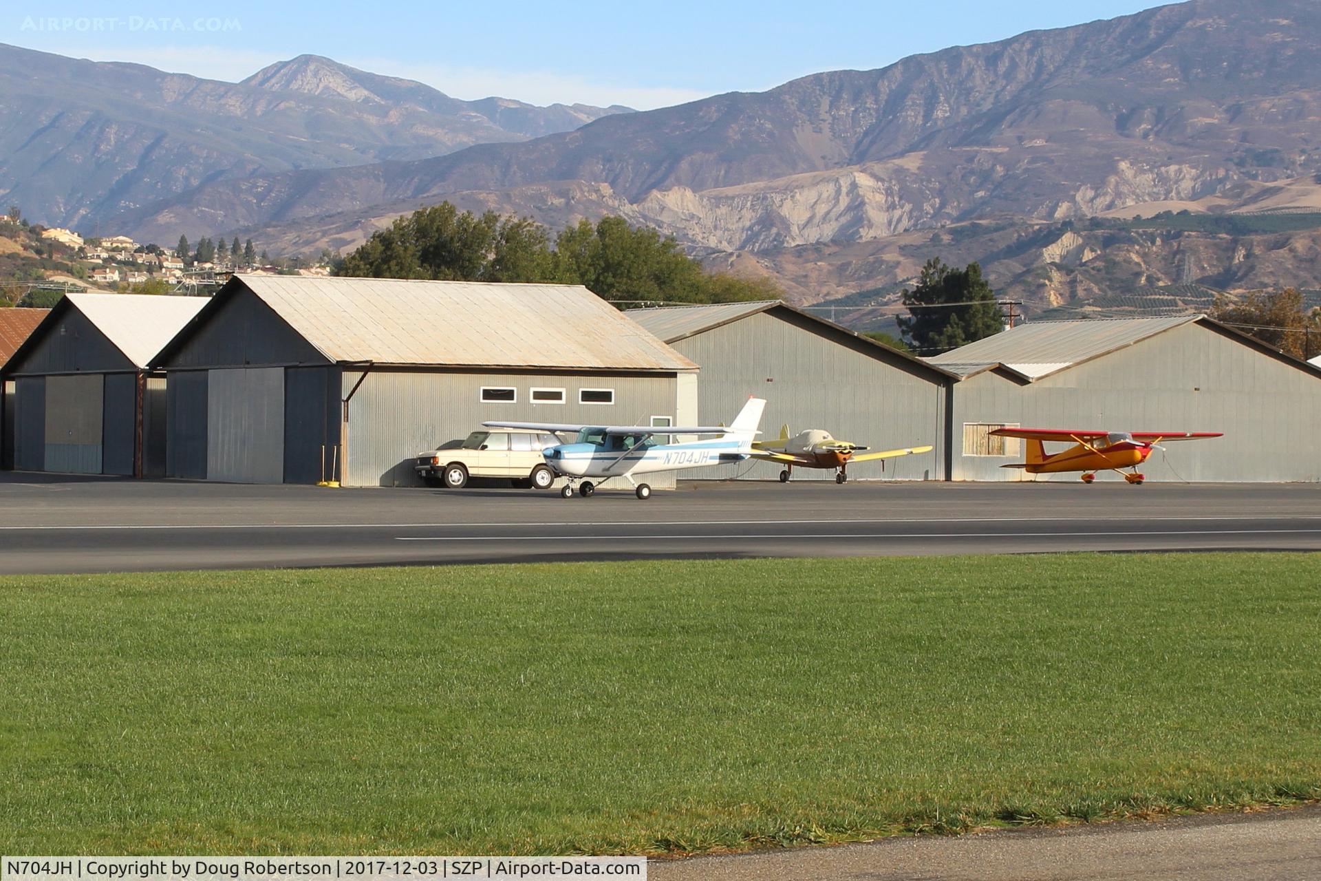 N704JH, 1976 Cessna 150M C/N 15078644, 1976 Cessna 150M, Continental O-200 100 Hp, holding short Rwy 04 behind several  other aircraft
