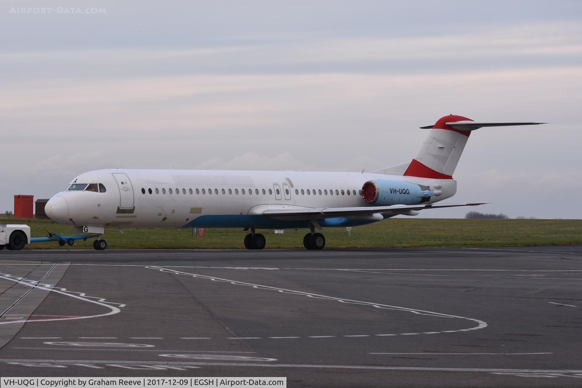 VH-UQG, 1993 Fokker 100 (F-28-0100) C/N 11446, Under tow at Norwich.