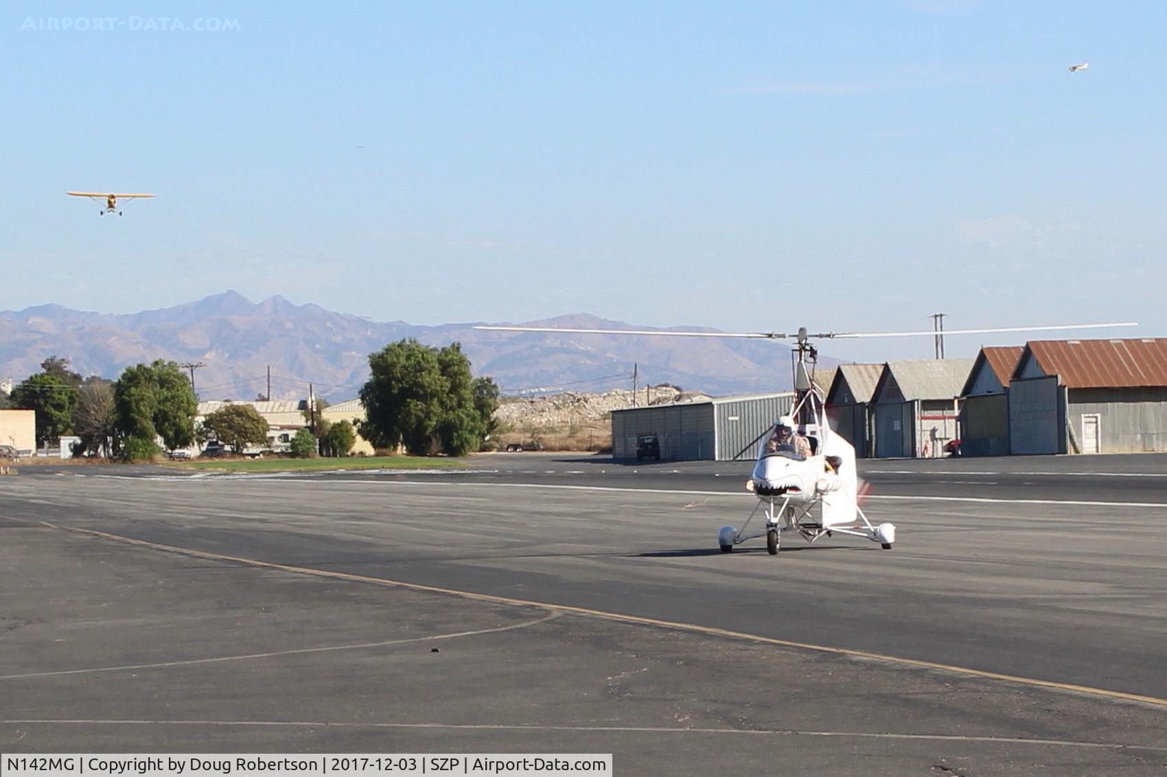 N142MG, 1999 Givans Mark E Predator C/N 1, 1999 Givans PREDATOR Mk1 powered autogyro one-off, Lycoming O-320-B1A 160 Hp pusher upgrade, two-place tandem seating, Experimental class, landed on Rwy 22, taxi to Transient ramp