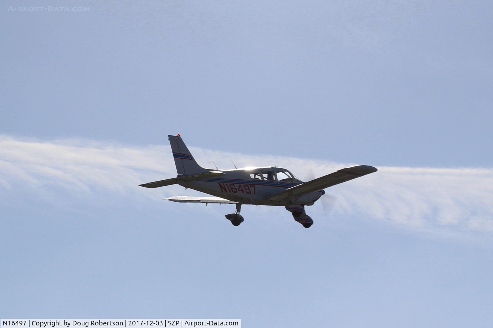 N16497, 1973 Piper PA-28-235 Cherokee Charger C/N 28-7310101, 1973 Piper PA-28-235 CHARGER, Lycoming IO-540-D4B5 235 Hp, takeoff climb Rwy 22, Young Eagles flight
