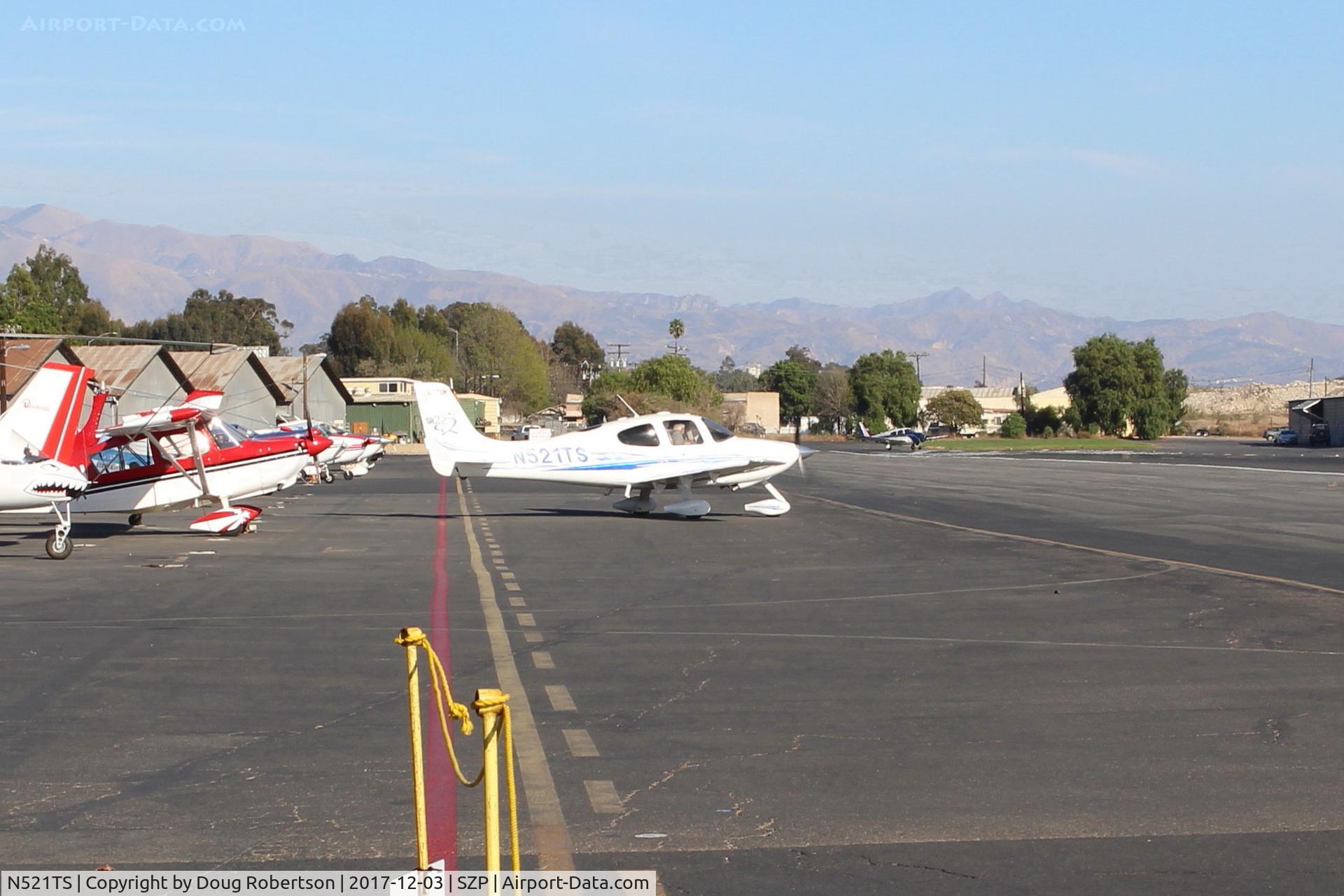 N521TS, 2005 Cirrus SR22 G2 C/N 1753, 2005 Cirrus SR-22 G2, Continental IO-550-N 310 Hp, spotting the aircraft on transient ramp
