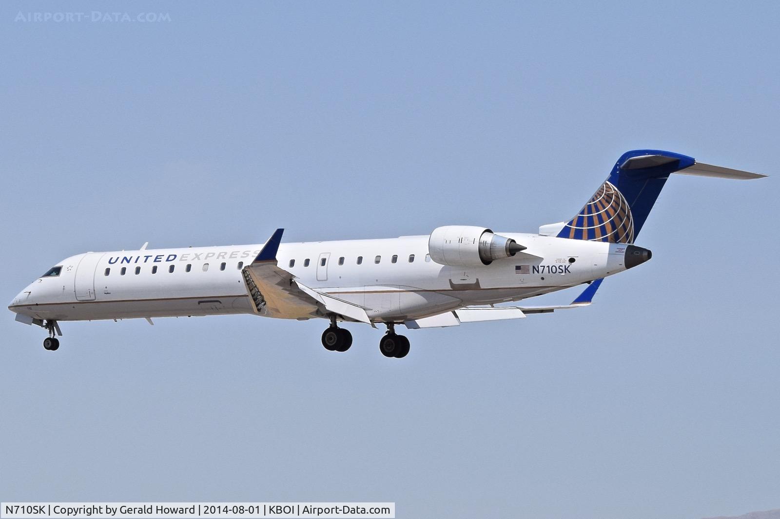 N710SK, 2004 Bombardier CRJ-700 (CL-600-2C10) Regional Jet C/N 10170, Landing RWY 28L.