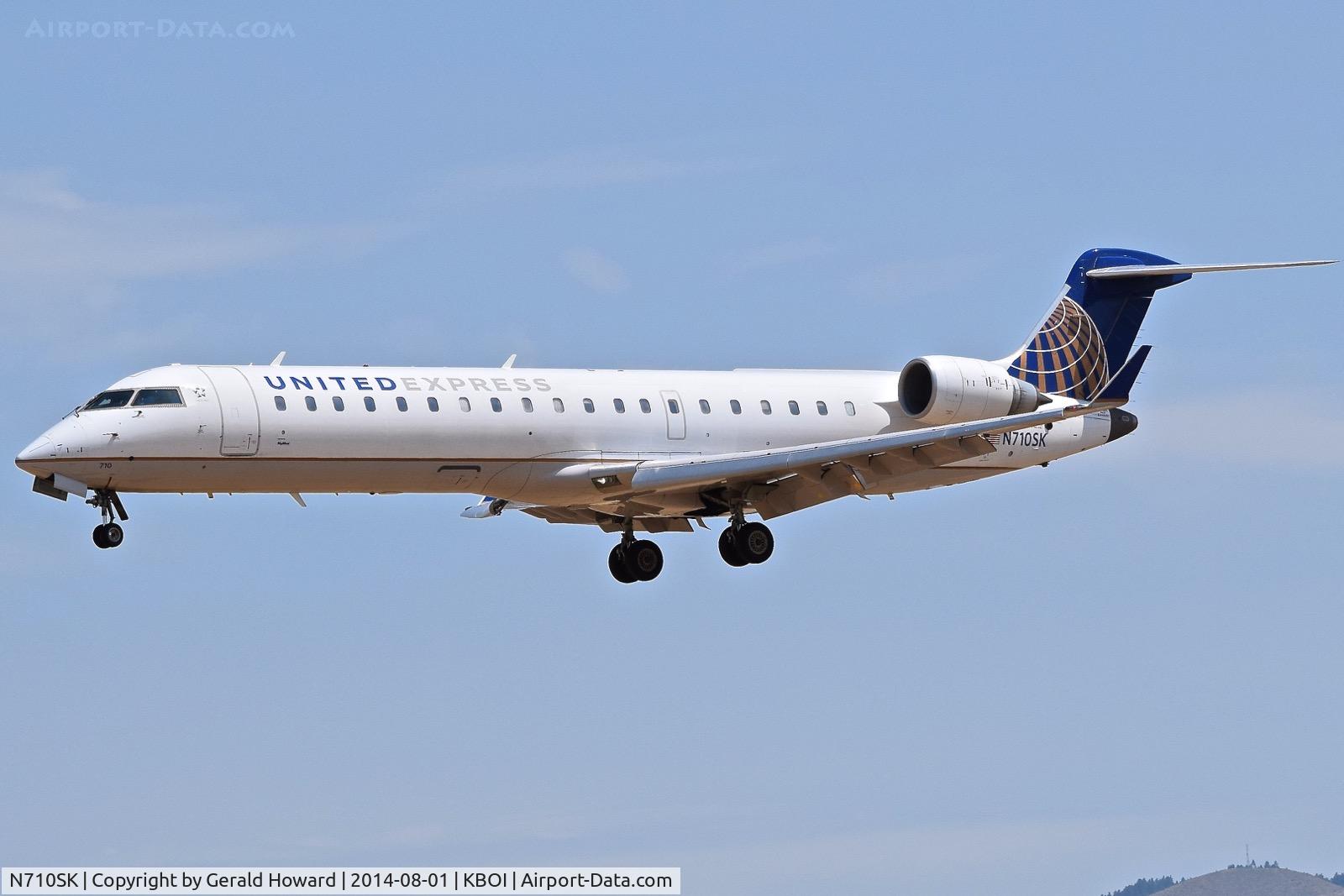 N710SK, 2004 Bombardier CRJ-700 (CL-600-2C10) Regional Jet C/N 10170, Landing RWY 28l.