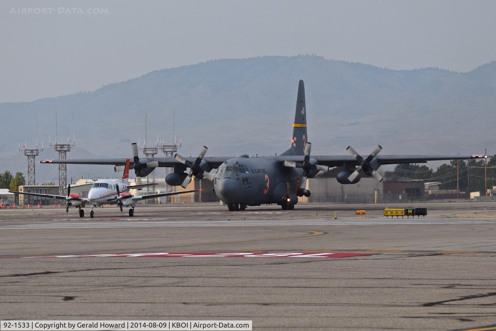 92-1533, 1992 Lockheed C-130H Hercules C/N 382-5322, Taxiing on Mike to RWY 28L for a fire mission. Following a NIFC controller.