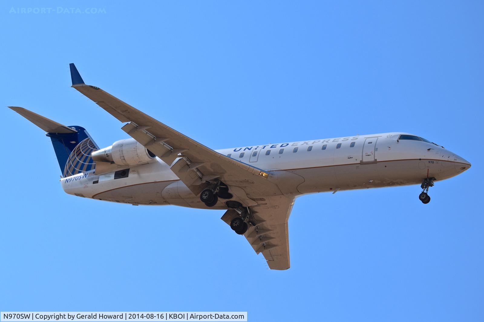 N970SW, 2003 Bombardier CRJ-200ER (CL-600-2B19) C/N 7881, Landing RWY 28R.