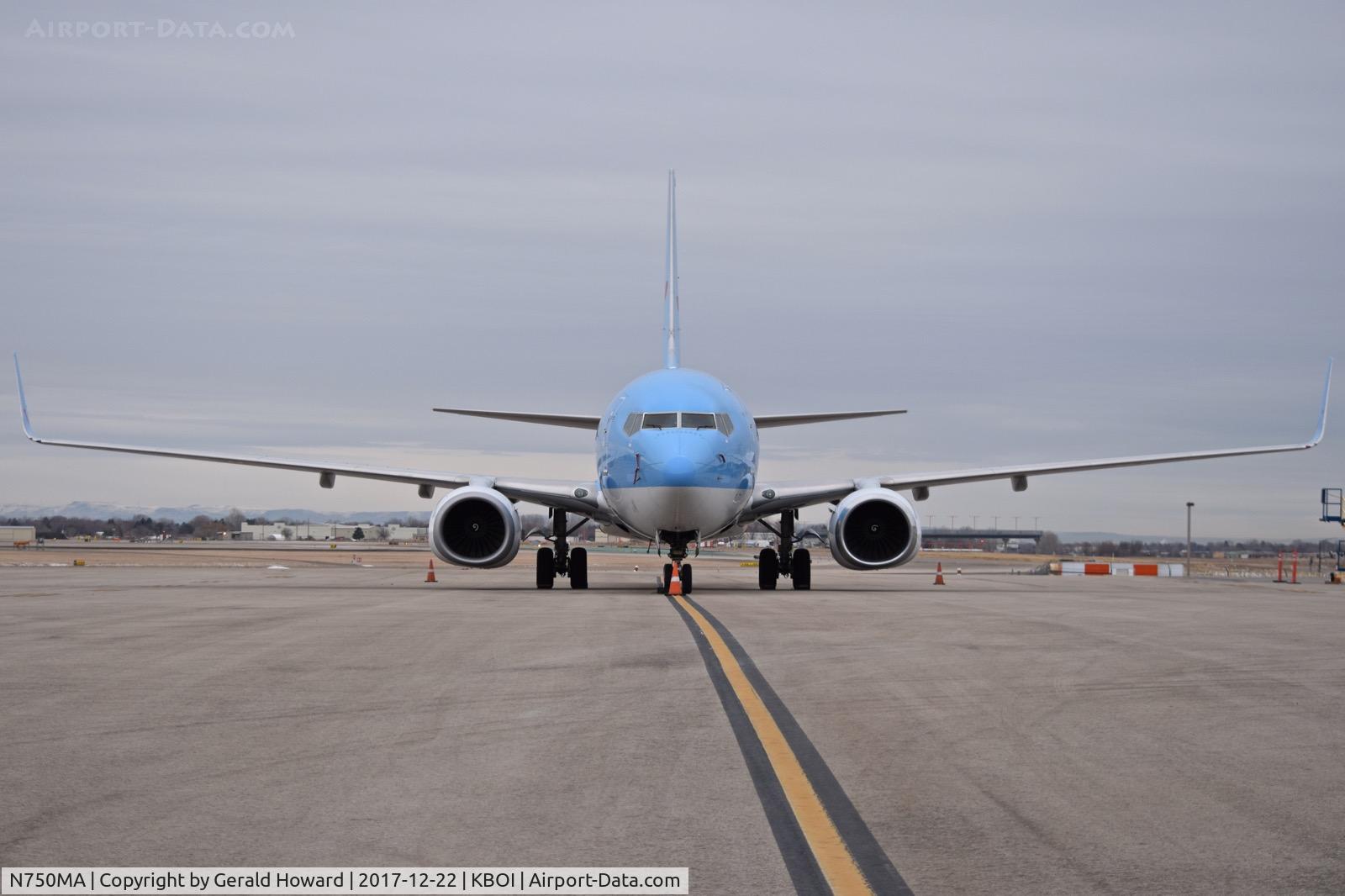 N750MA, 2009 Boeing 737-8K5 C/N 35148, Parked on north GA ramp. Charter flight for visiting football team.
