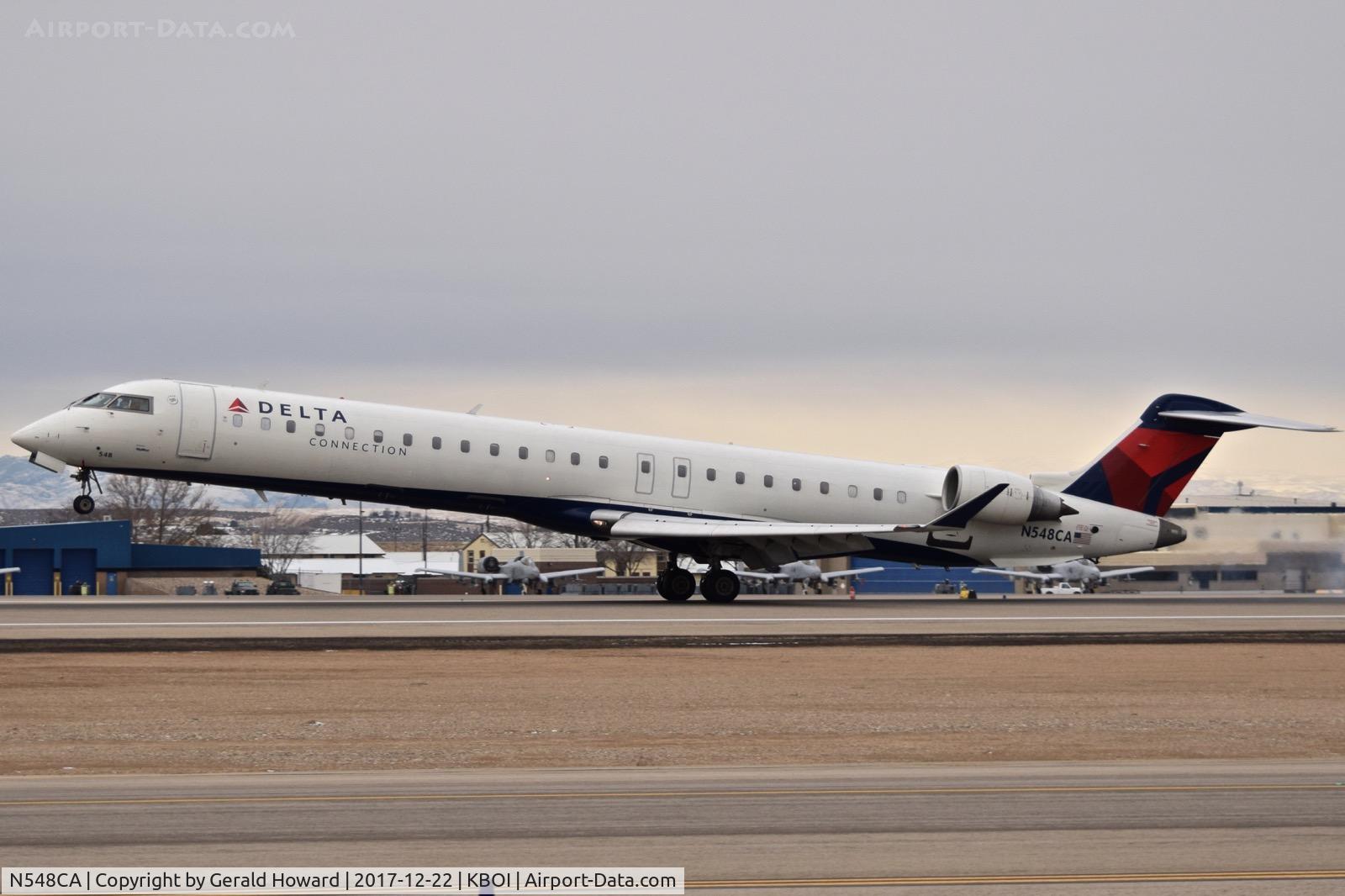 N548CA, 2008 Bombardier CRJ-900ER (CL-600-2D24) C/N 15159, Landing roll out on RWY 10L.