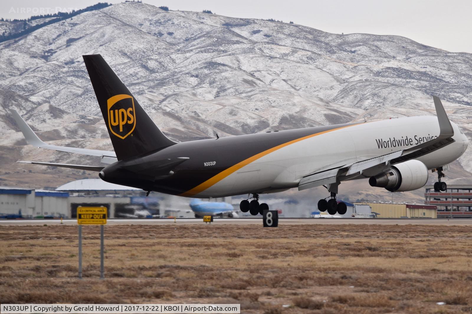N303UP, 1995 Boeing 767-34AF C/N 27241, About to touch down on RWY 10R.