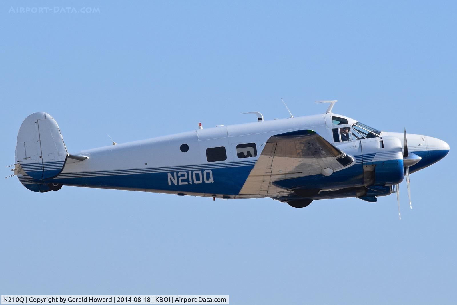 N210Q, 1957 Beech E18S-9700 C/N BA-291, Departing RWY 10R.