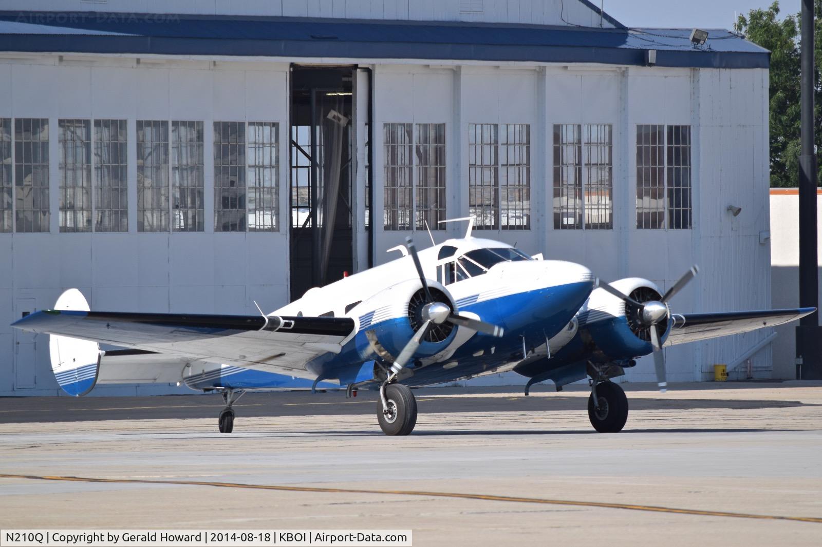 N210Q, 1957 Beech E18S-9700 C/N BA-291, Taxiing from the south GA ramp.