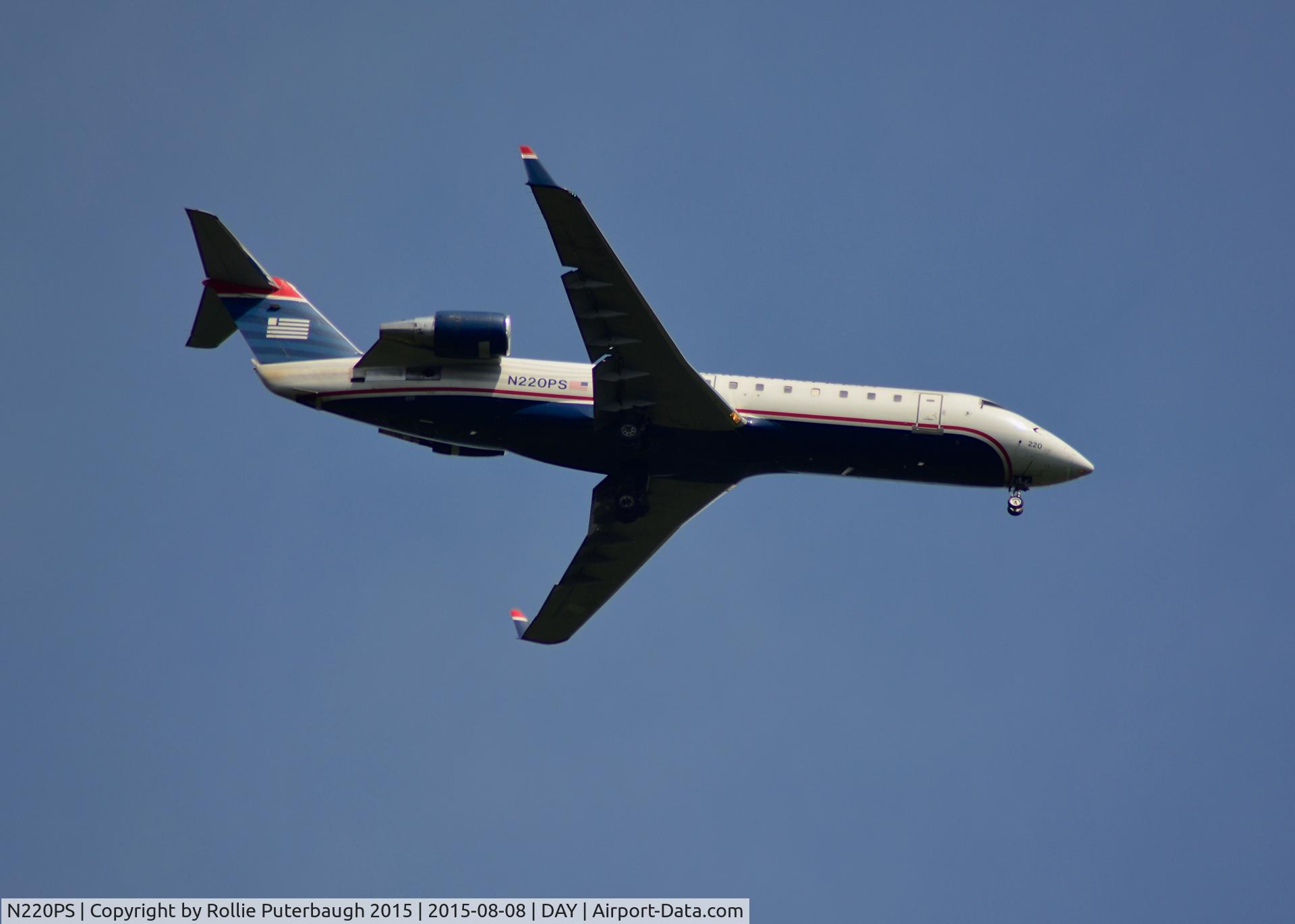 N220PS, Bombardier CRJ-200ER (CL-600-2B19) C/N 7887, PSA Airlines {United Express/American Airlines} Canadair Jet CRJ-200ER, N220PS, approaches Runway 6 right at the Dayton International Airport on August 8, 2015 arriving from Philadelphia. Visit me by copy/paste: https://steemit.com/@rollie13 .